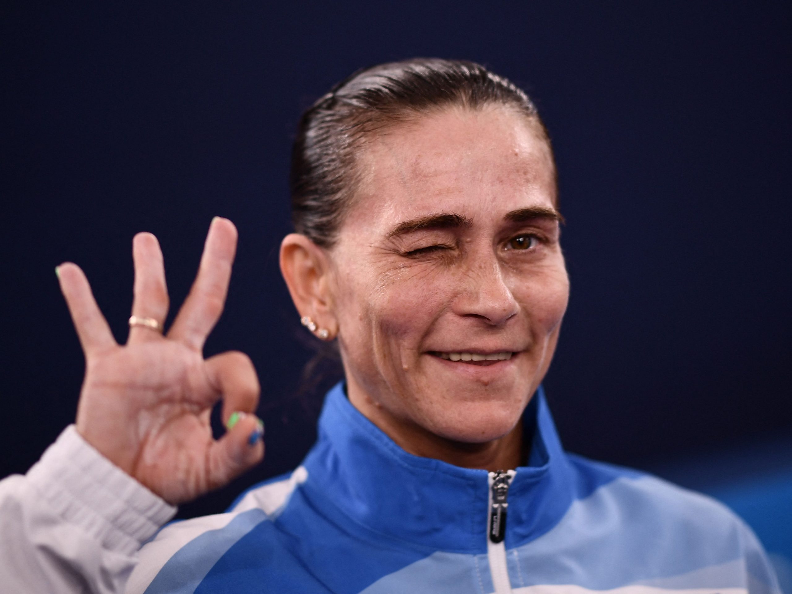 Oksana Chusovitina winked for the cameras during the Tokyo Olympics.