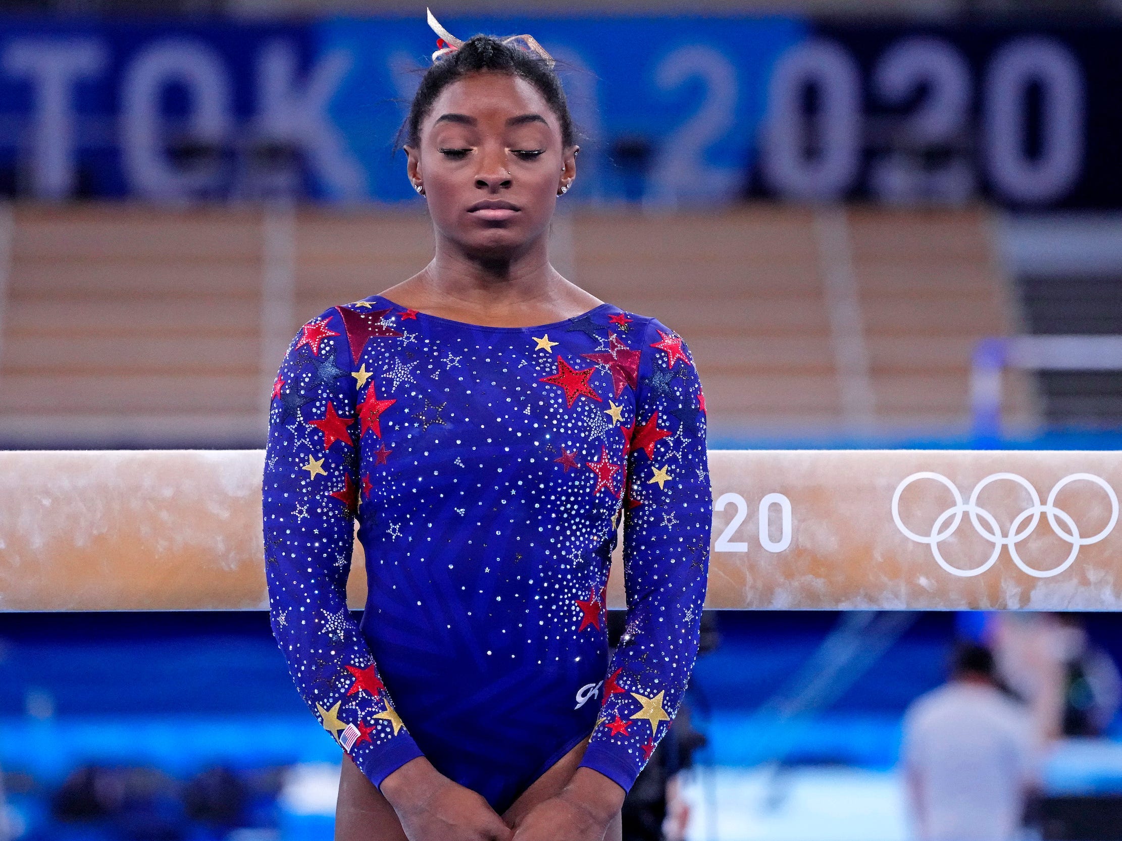 Simone Biles competes on the balance beam during the Tokyo Olympics.