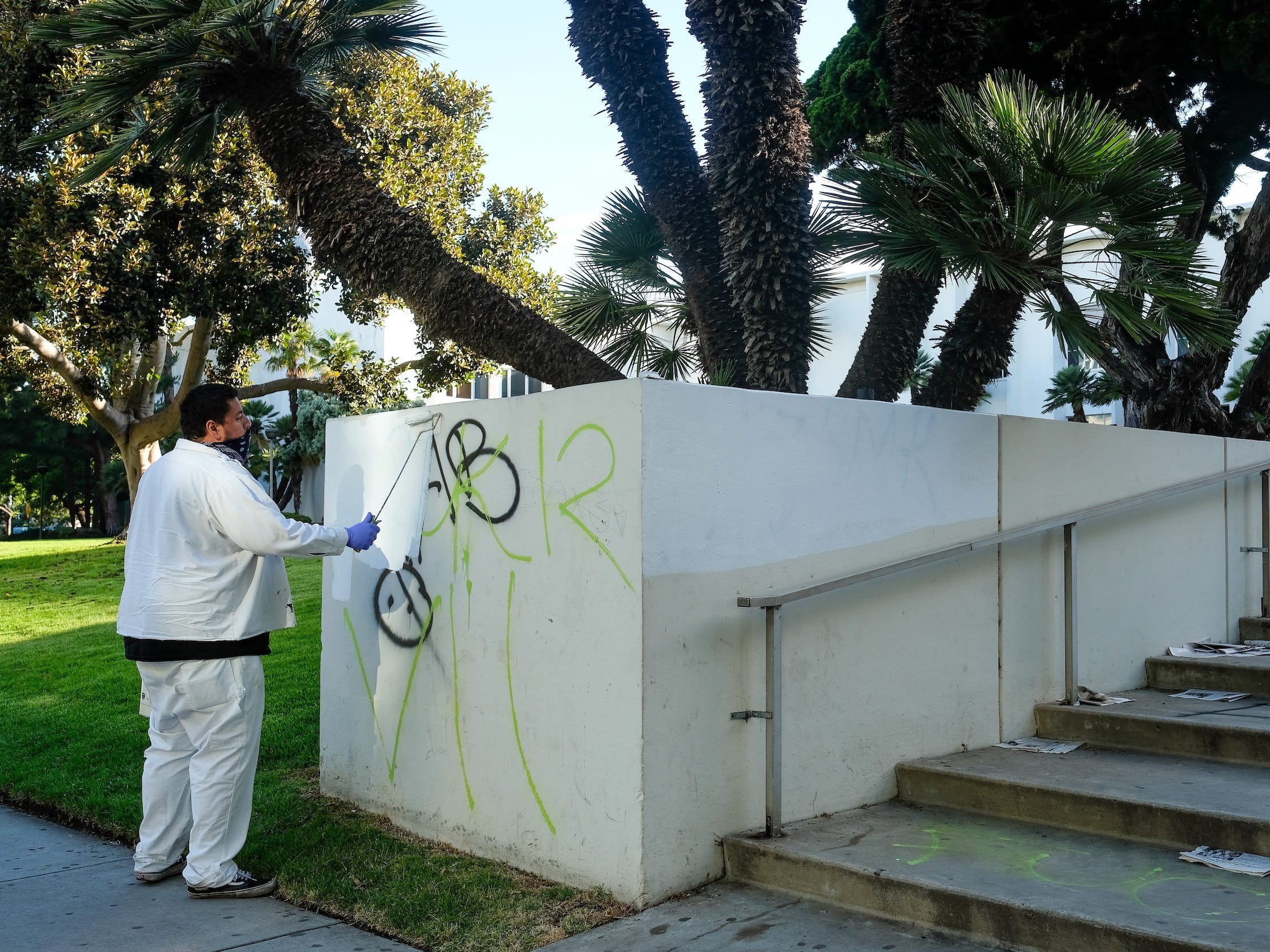 cleaning courthouse graffiti LA protests photo by Stacey Leasca