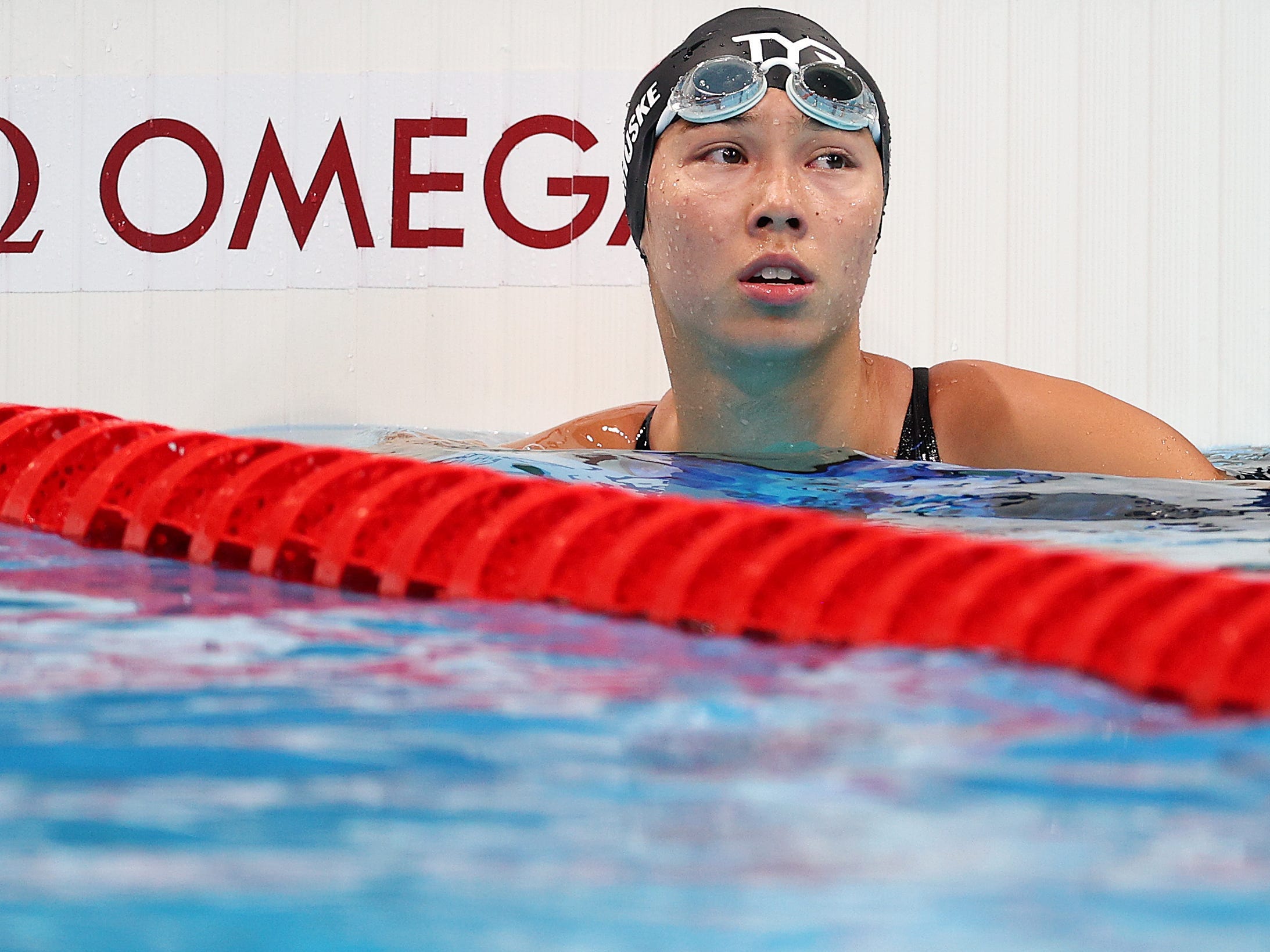 American Torri Huske reacts after the 100-meter butterfly final.