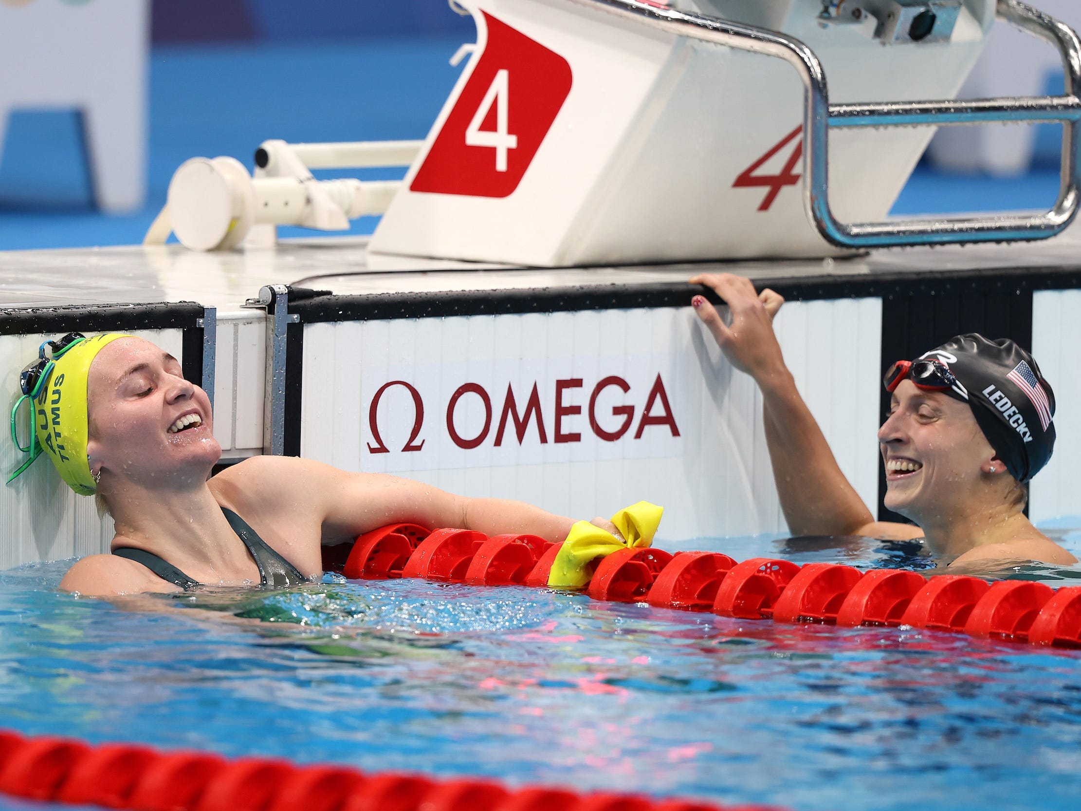 Katie Ledecky (right) smiles after finishing second behind Australia's Ariarne Titmus in the 400-meter final.
