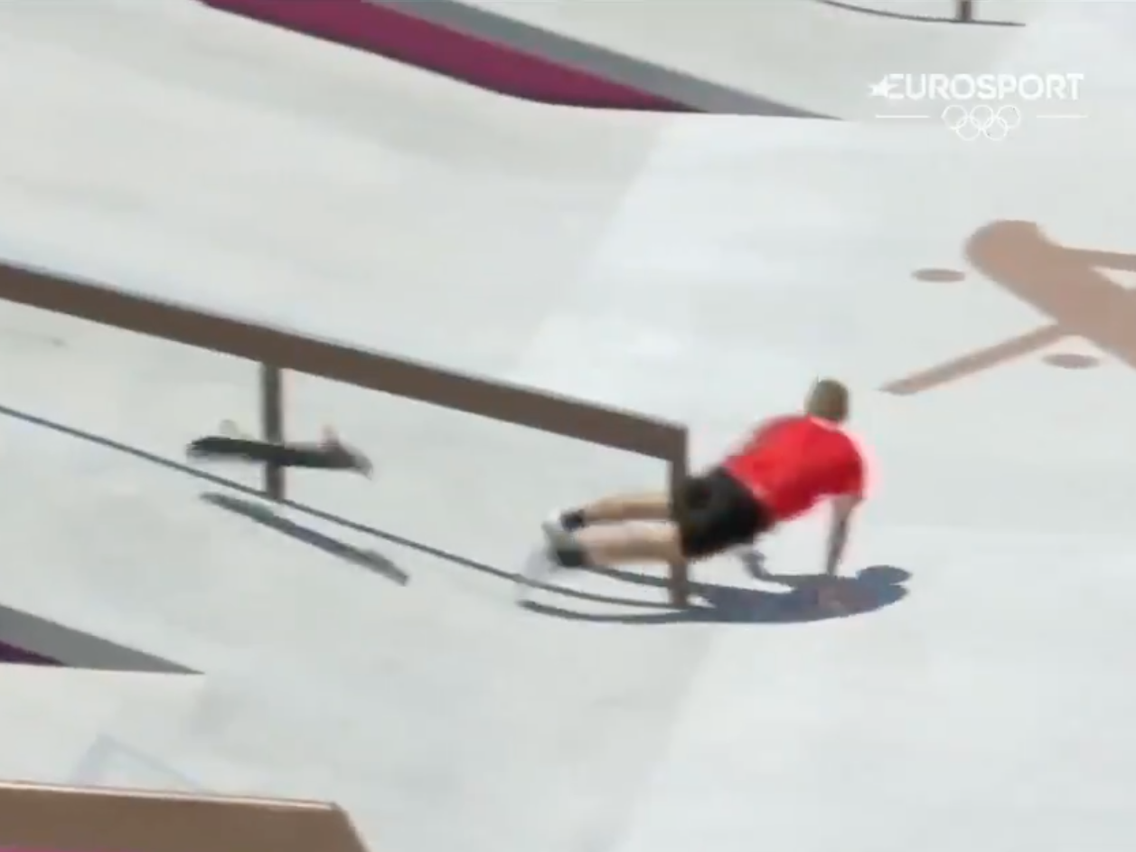 Peruvian skateboarder Angelo Caro Narvaez falling from his board during the Olympics