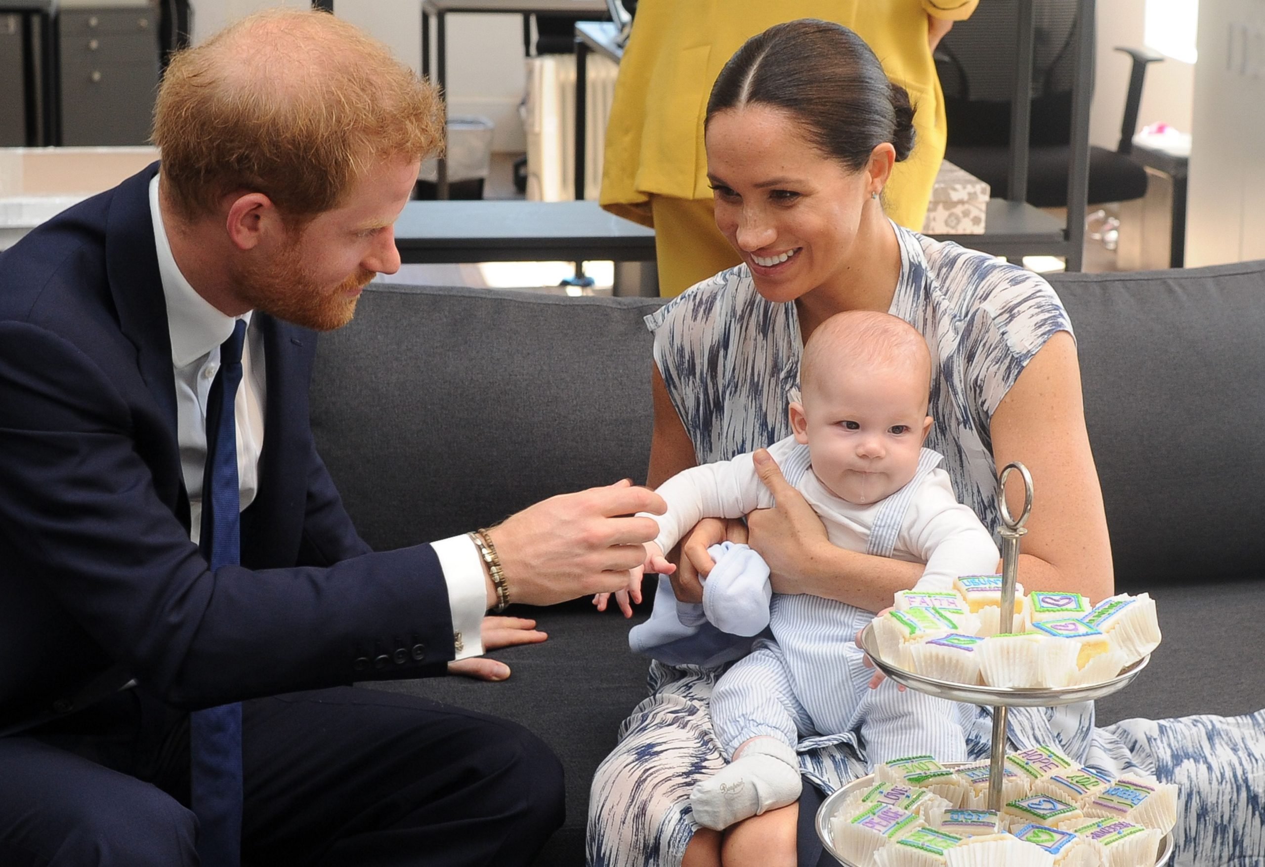 Prince Harry pictured with his wife Meghan Markle and son Archie on a trip to South Africa in 2019.