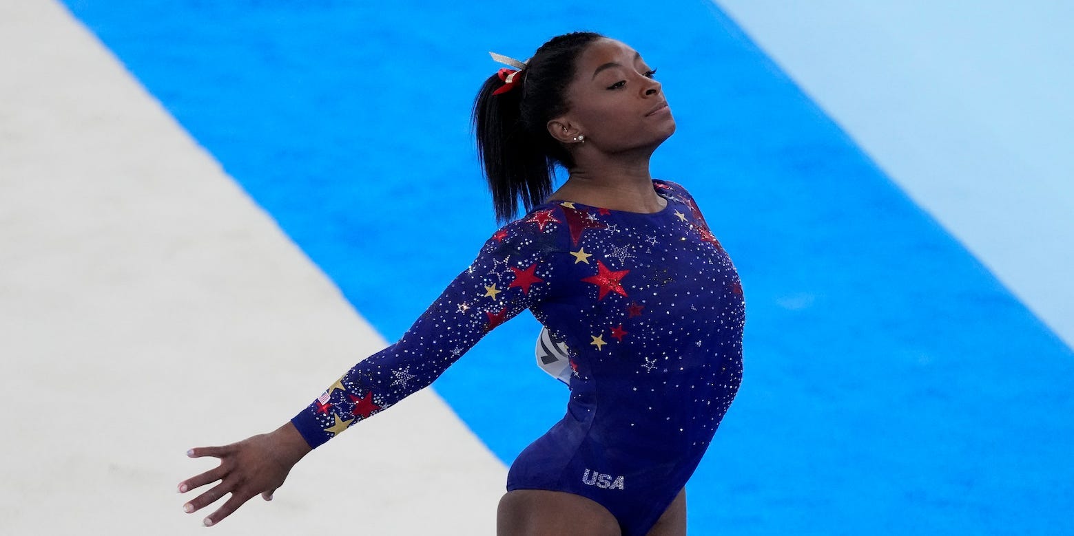 Simone Biles says it feels 'like I have the weight of the world on my ...