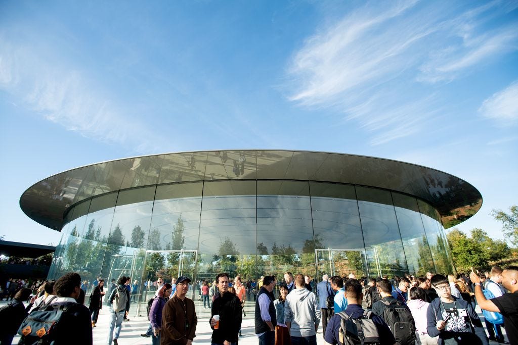 Attendees gather for a product launch event at Apple headquarters in Cupertino, California