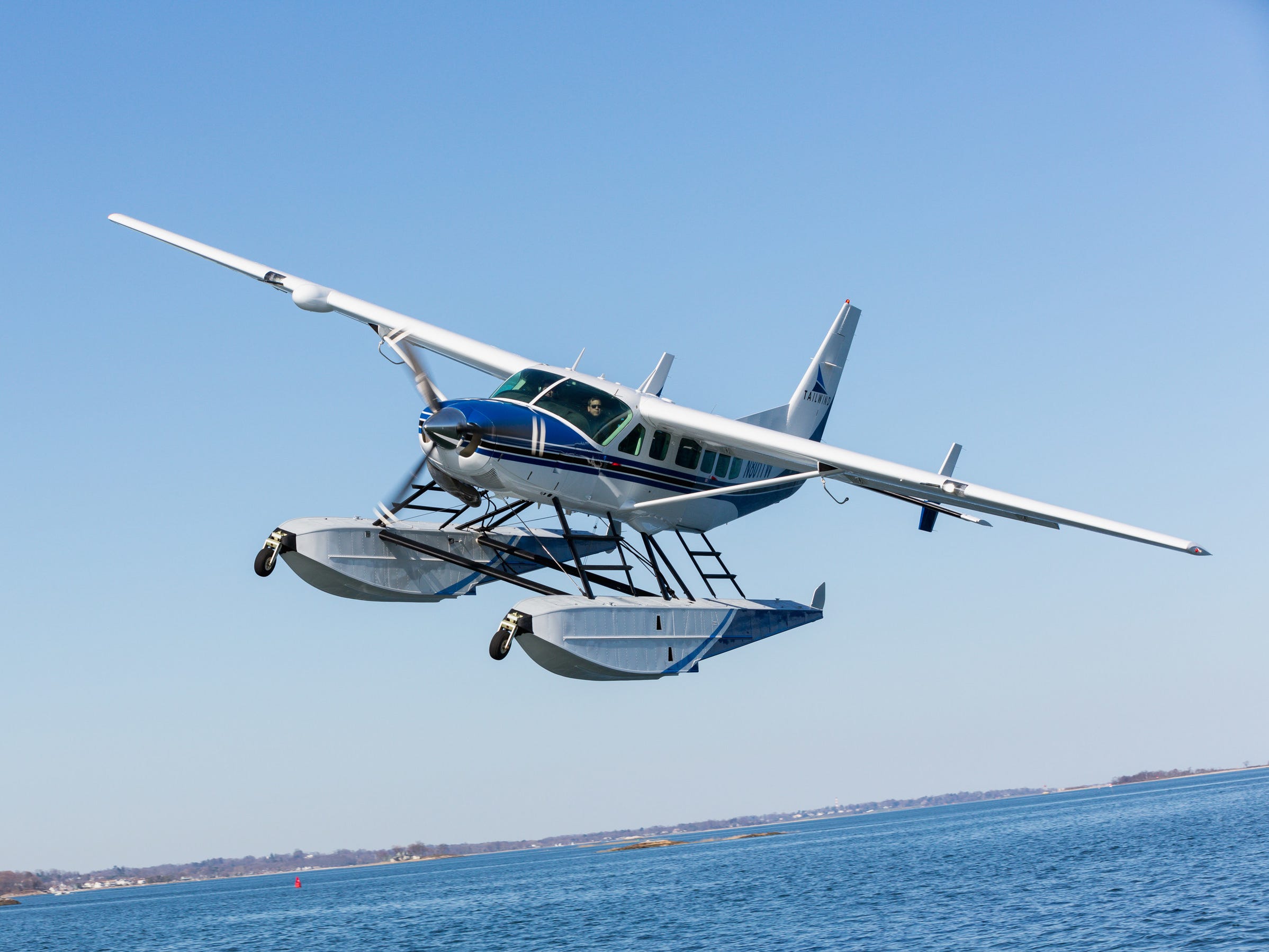 A Cessna Caravan seaplane in Boston Harbor - Tailwind Air Cessna Caravan seaplane