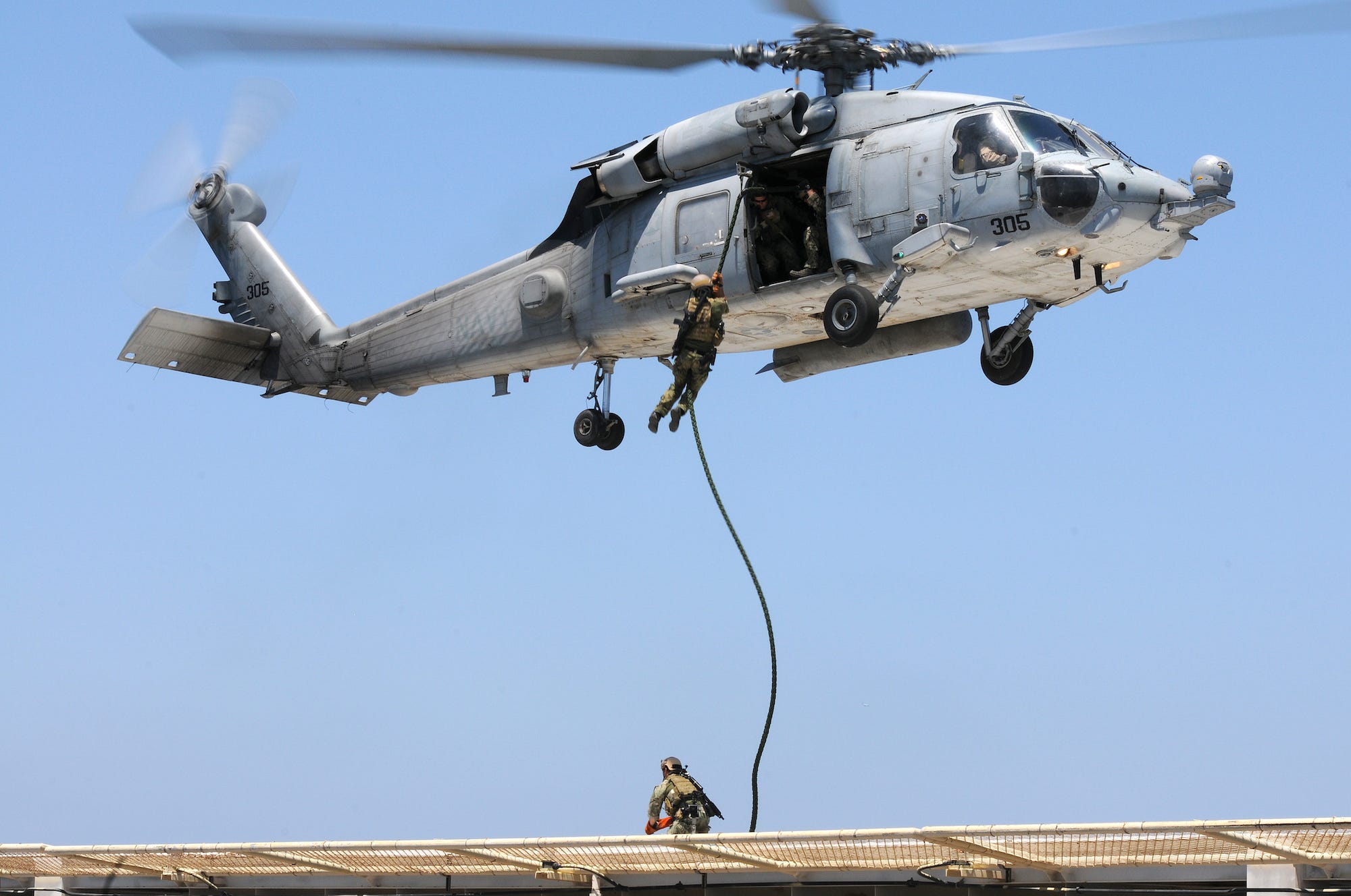 Navy SEAL fast rope helicopter