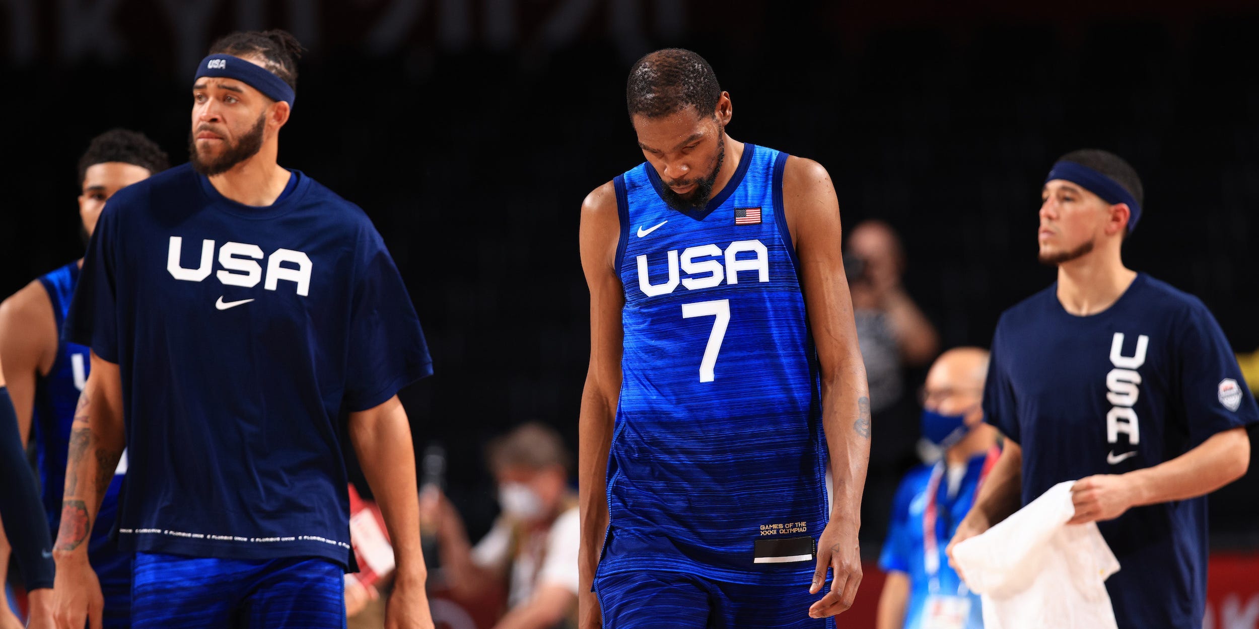 Kevin Durant #7 and JaVale McGee #11 of Team United States walk off the court after the United States lost to France in the Men's Preliminary Round Group B game on day two of the Tokyo 2020 Olympic Games at Saitama Super Arena on July 25, 2021 in Saitama, Japan.
