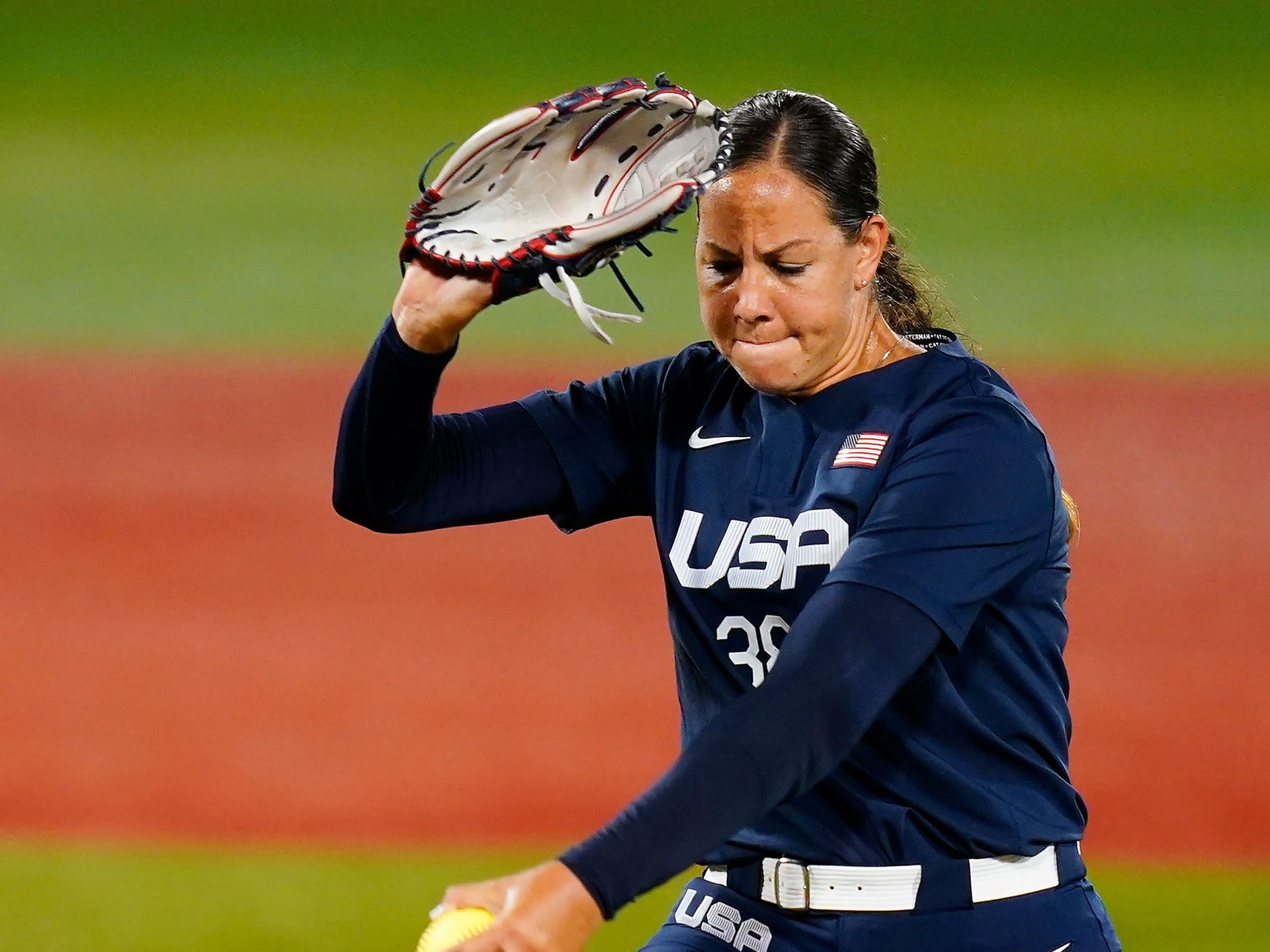 United States' Cat Osterman pitches during the first inning of a softball game against Japan at the 2020 Summer Olympics.