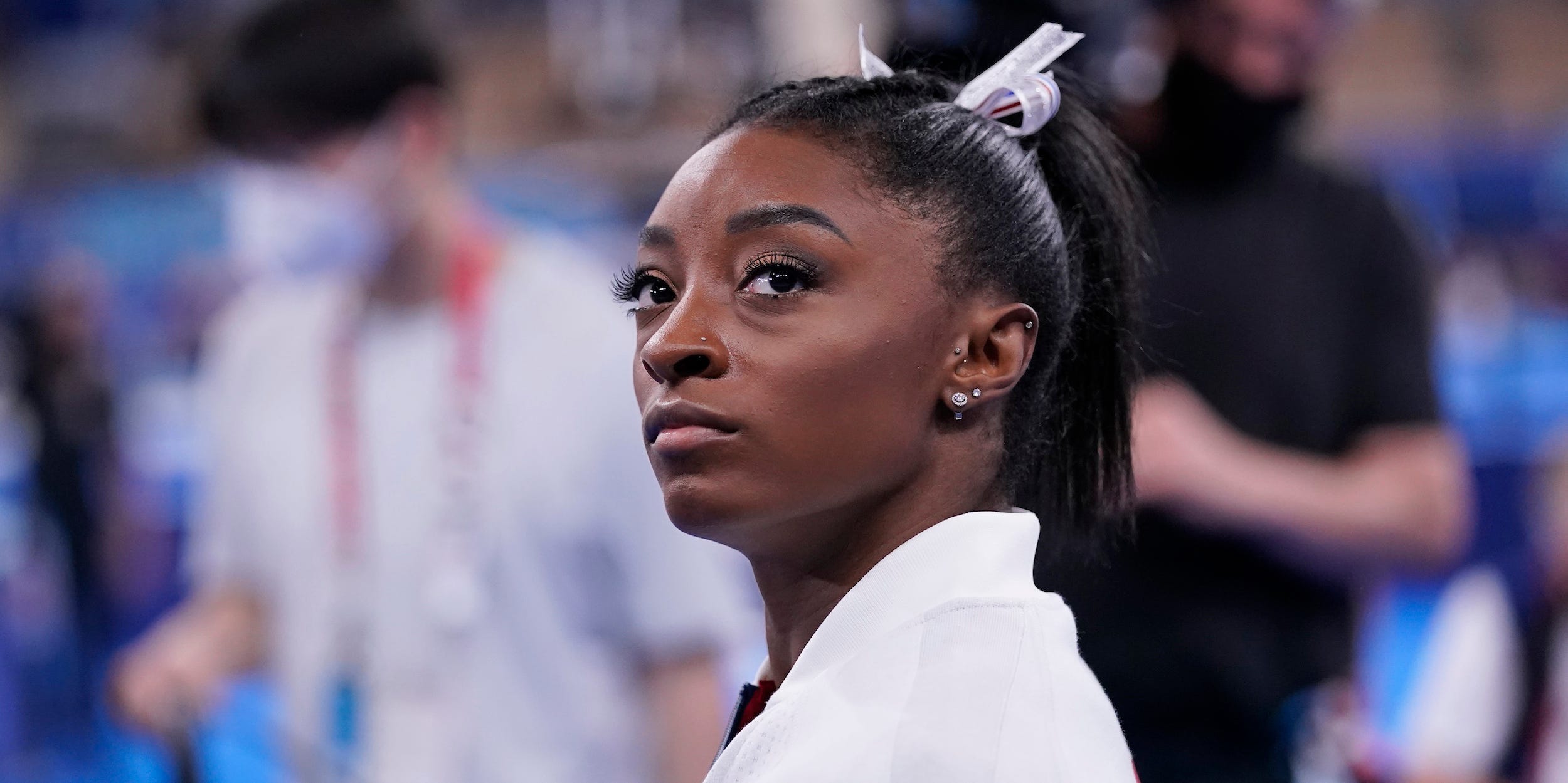 Simone Biles, of the United States, waits for her turn to perform during the artistic gymnastics women's final at the 2020 Summer Olympics, Tuesday, July 27, 2021, in Tokyo.