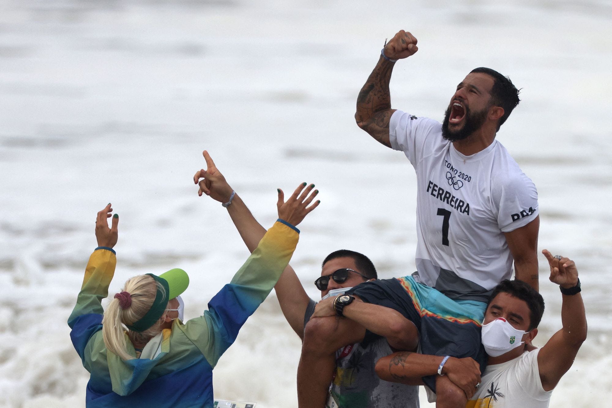 Italo Ferreira celebrates his victory at the 2020 Tokyo Olympics.