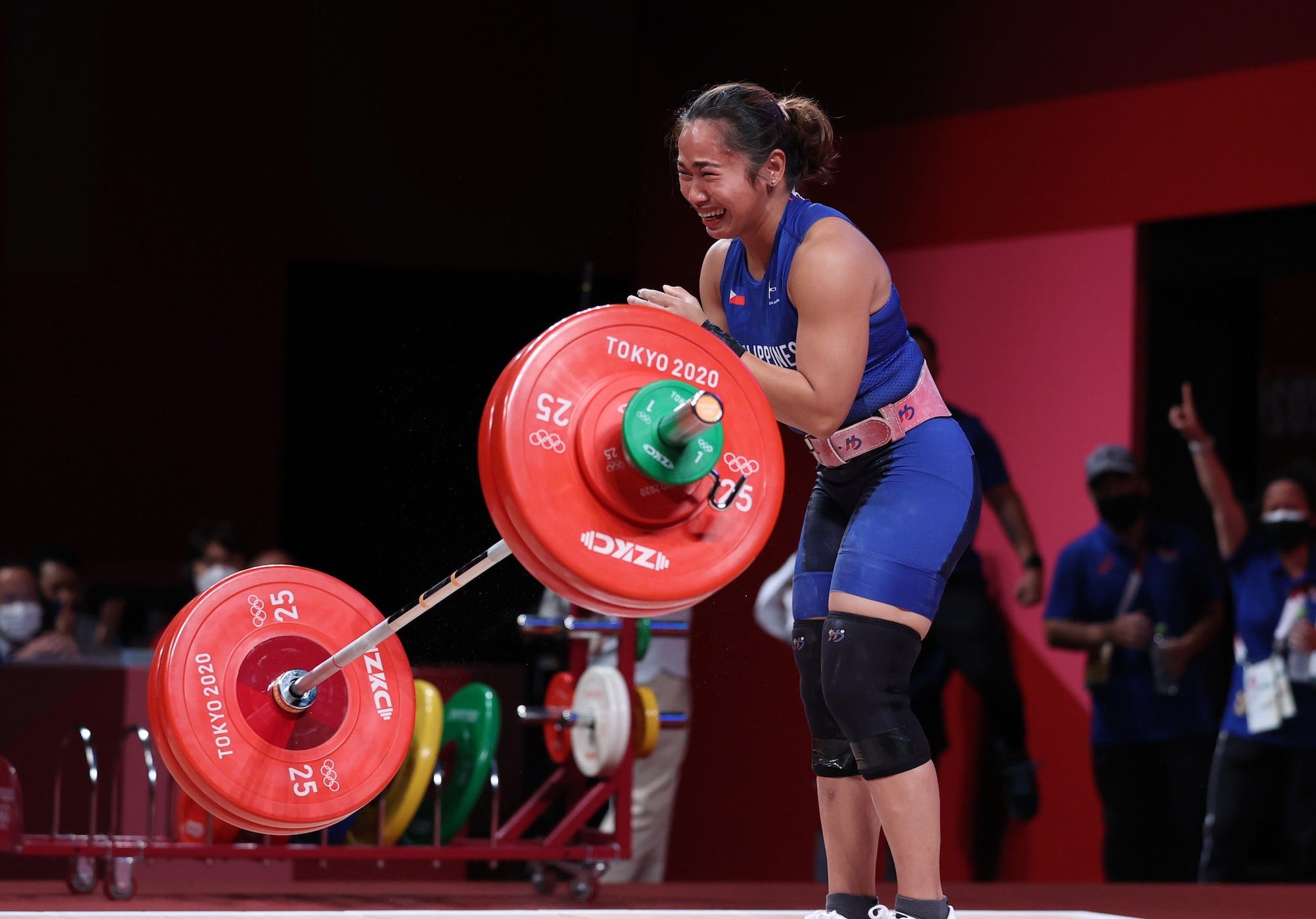 Hidilyn Diaz reacts after a lift during the weightlifting event at the Olympic Games in Tokyo.