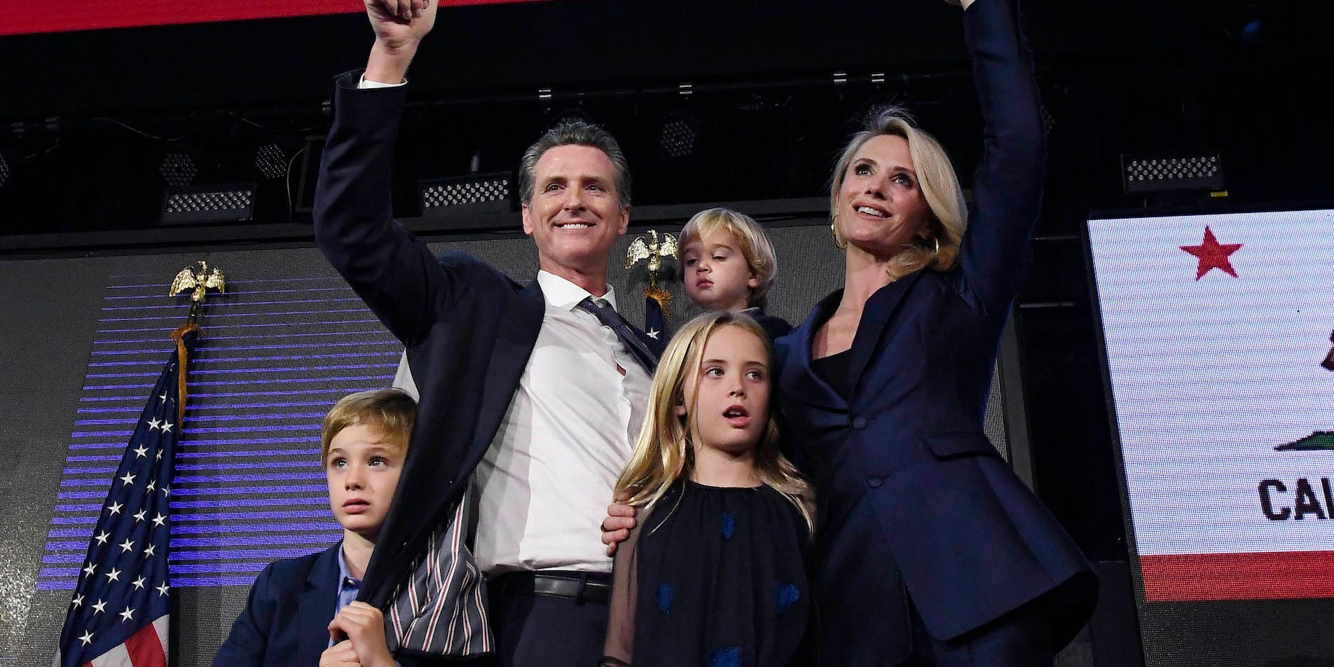 Gavin Newsom, his children, and wife.