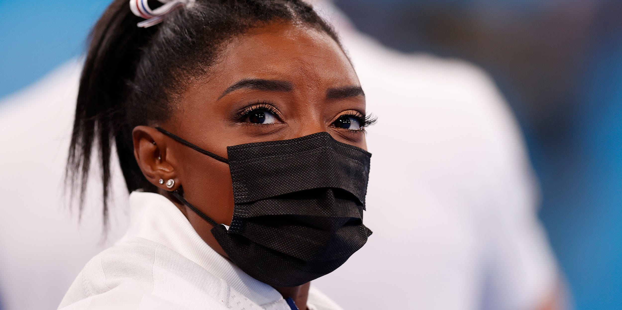 Simone Biles of Team United States looks on during the Women's Team Final on day four of the Tokyo 2020 Olympic Games at Ariake Gymnastics Centre on July 27, 2021 in Tokyo, Japan.(