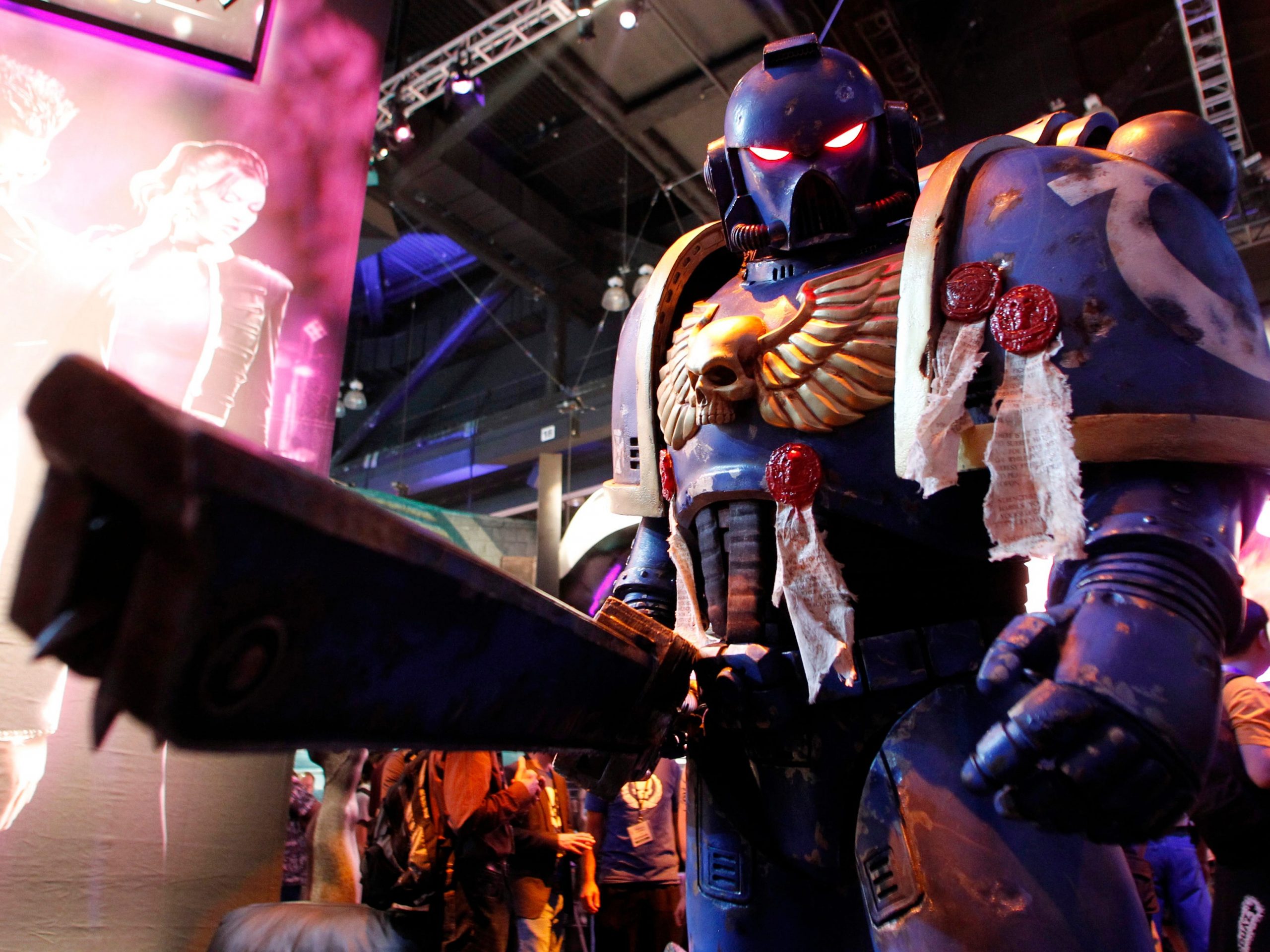 A person dressed up as a space marine from the popular fantasy game "Warhammer."