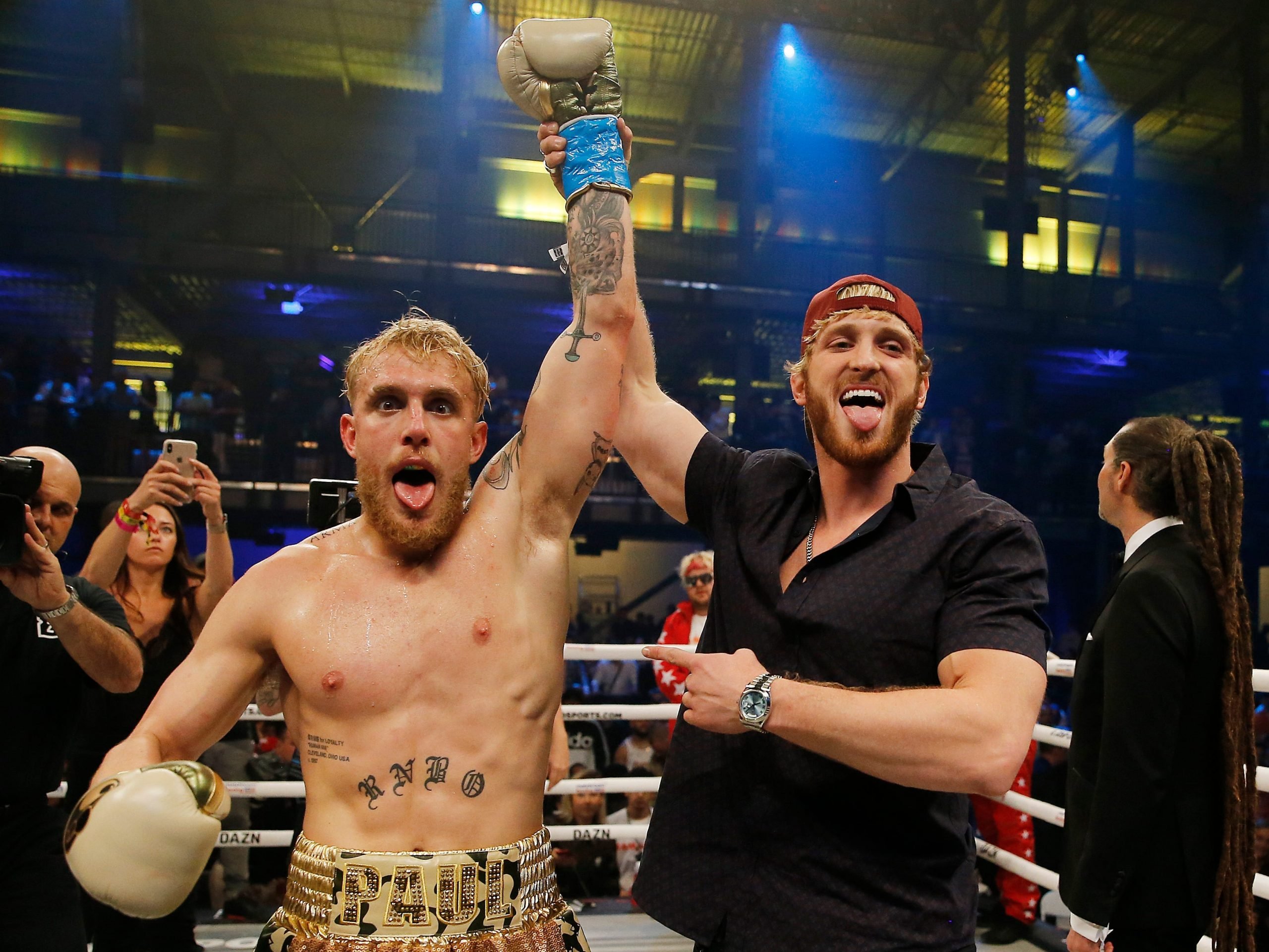 Logan and Jake Paul at a boxing match