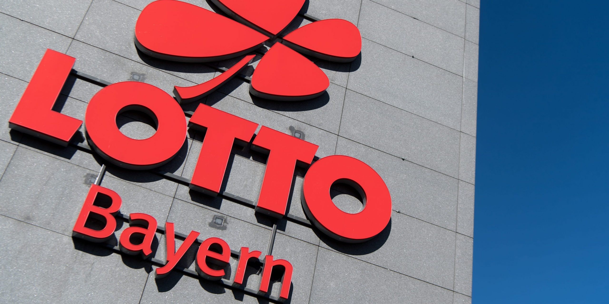 The logo and the lettering "Lotto Bayern" can be seen at the company building of the Lotto headquarters.