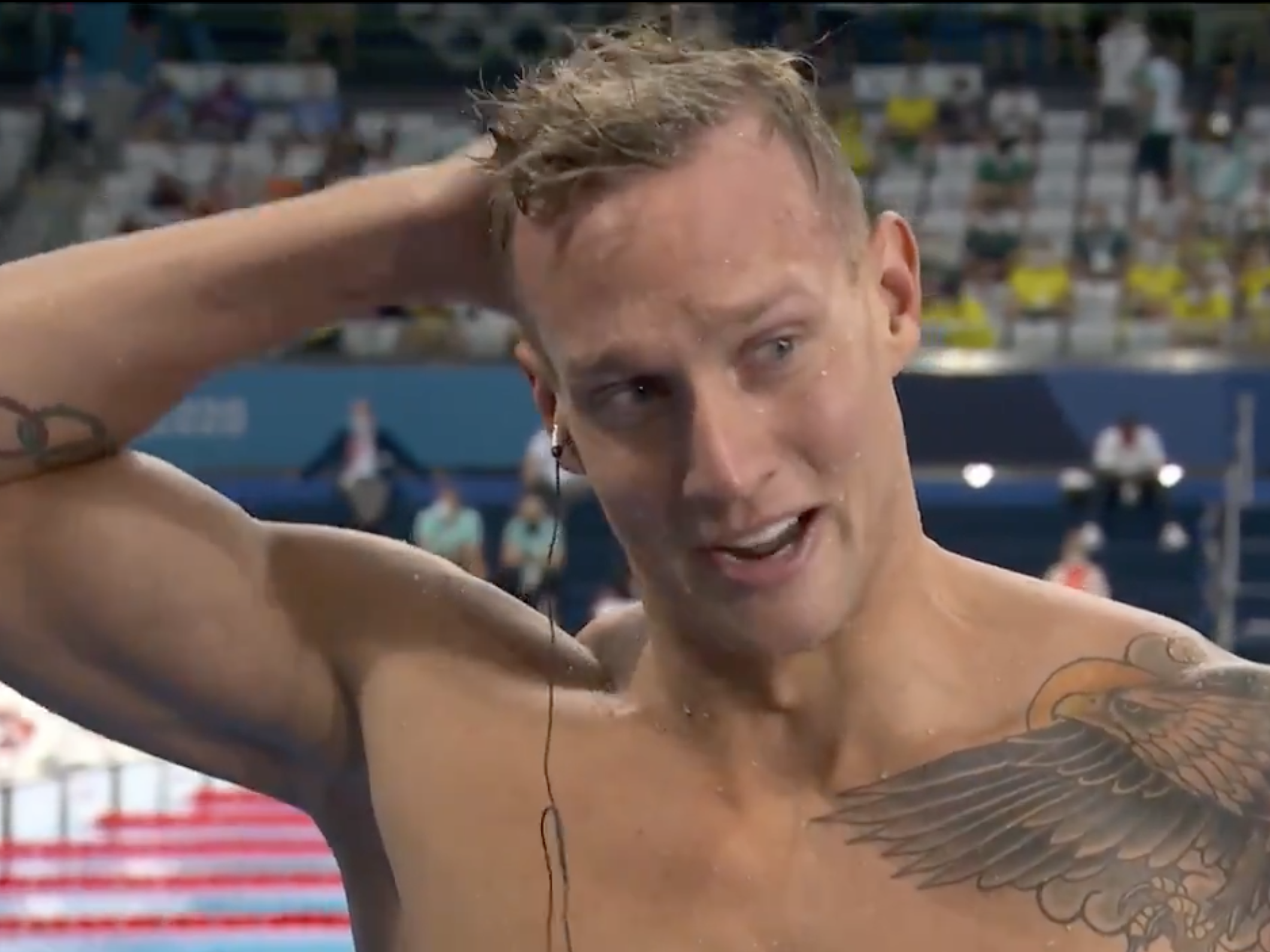 Caeleb Dressel reacts after winning gold at Tokyo 2020.