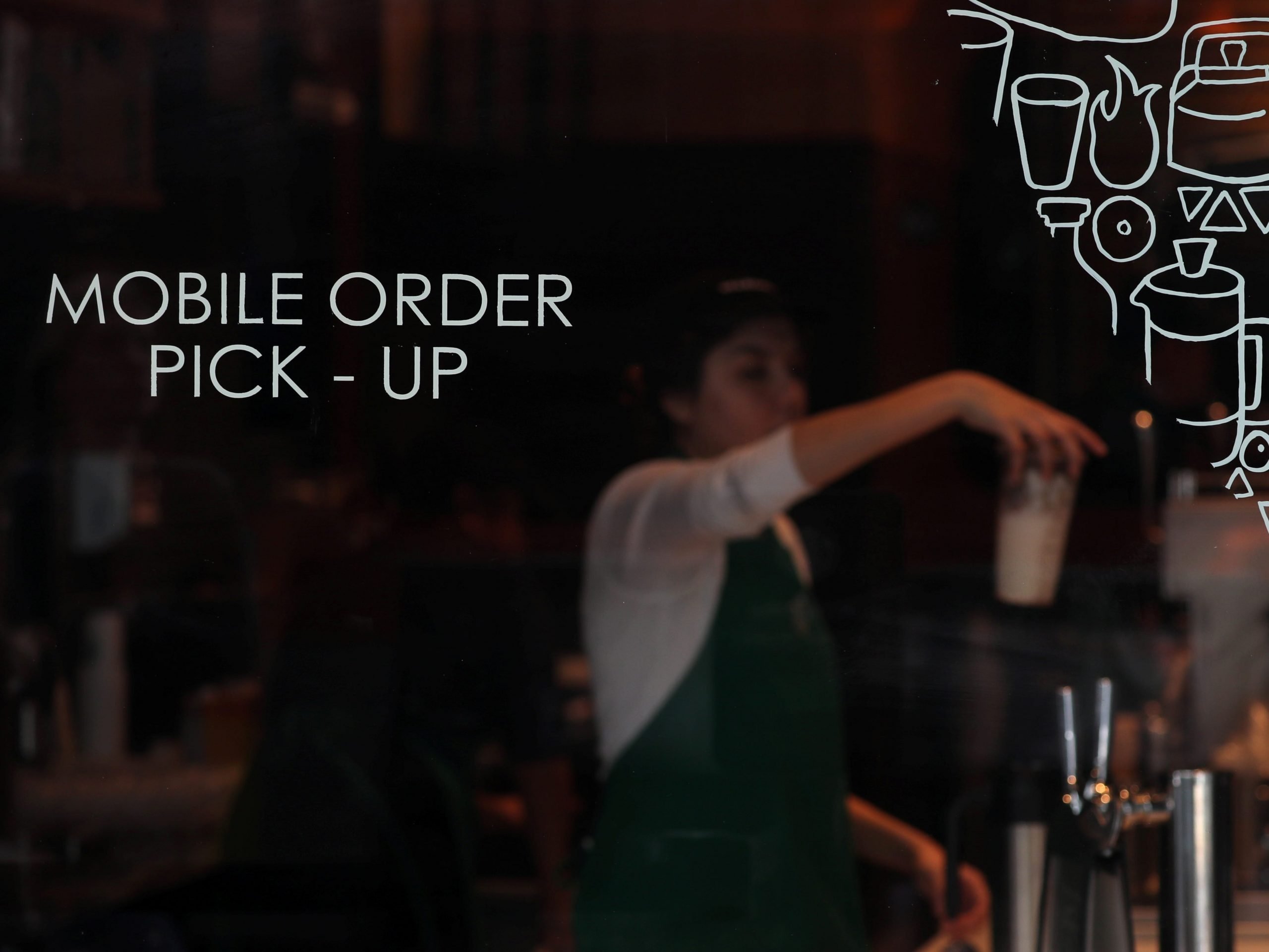 Starbucks barista makes mobile orders