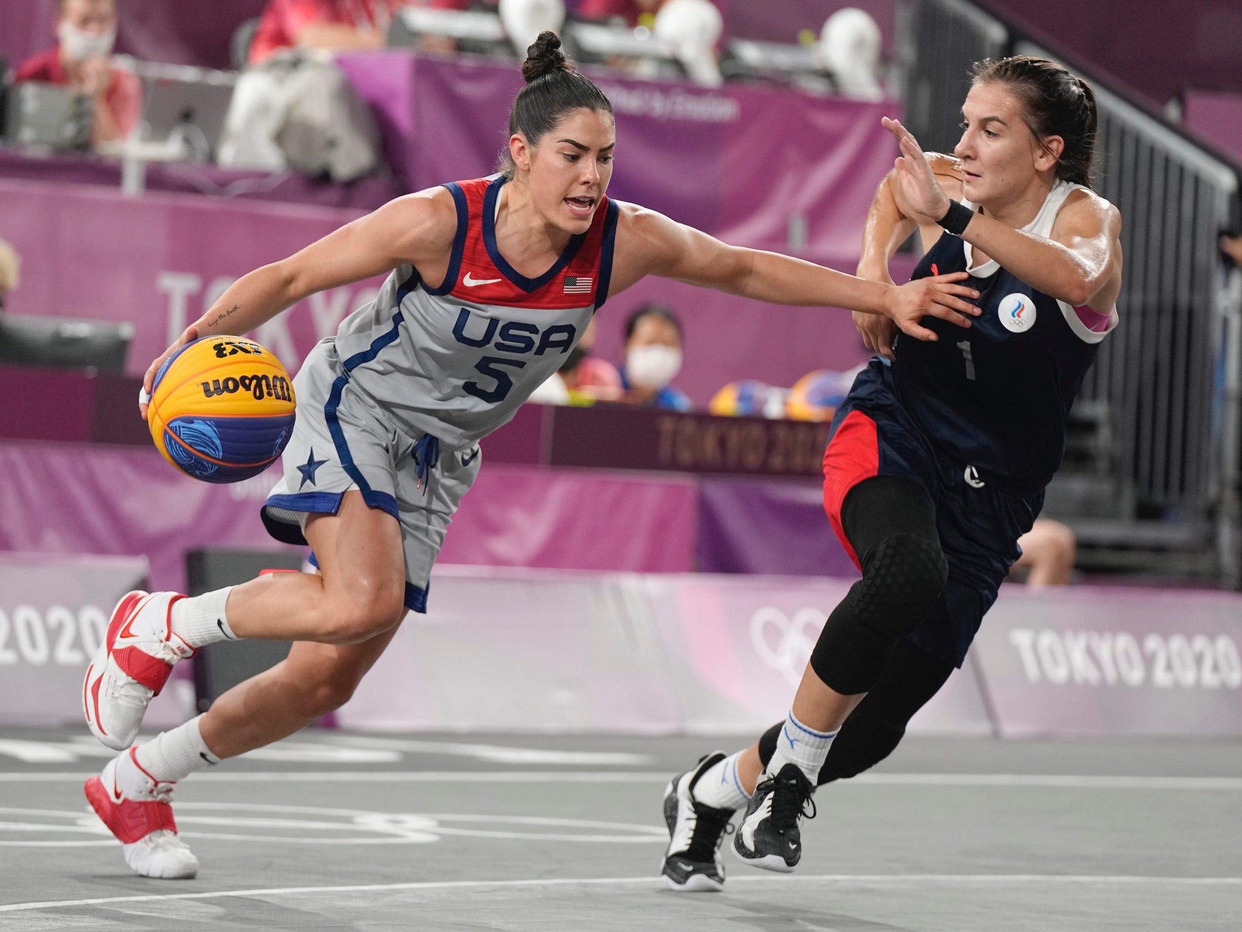 Kelsey Plum drives to the basket during women's 3x3 basketball at the Olympics.