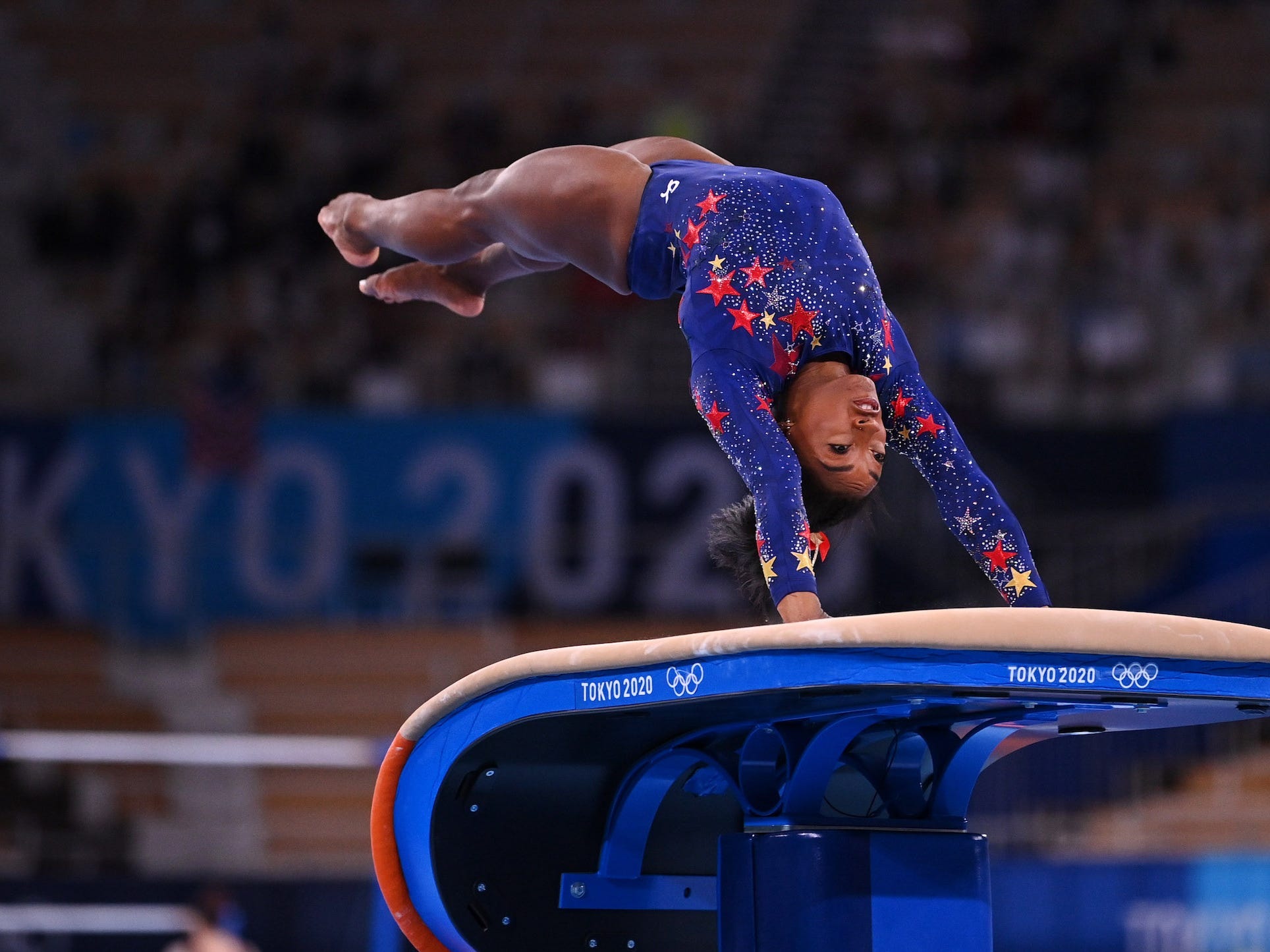 Simone Biles competes on the vault.