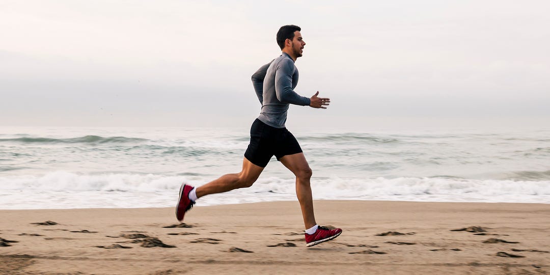 man running on beach