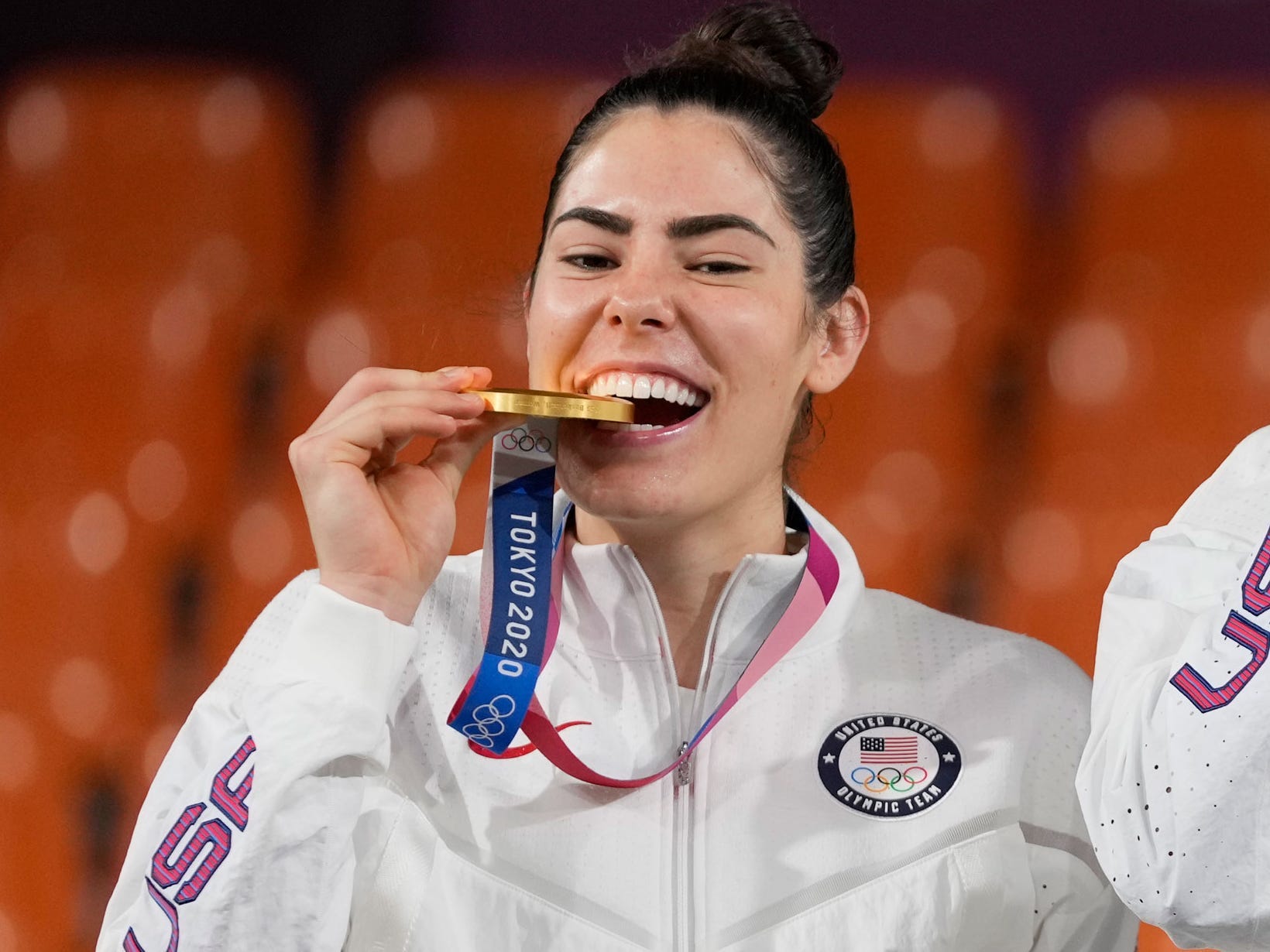 Kelsey Plum and Jackie Young pose with their gold medals at Tokyo 2020.