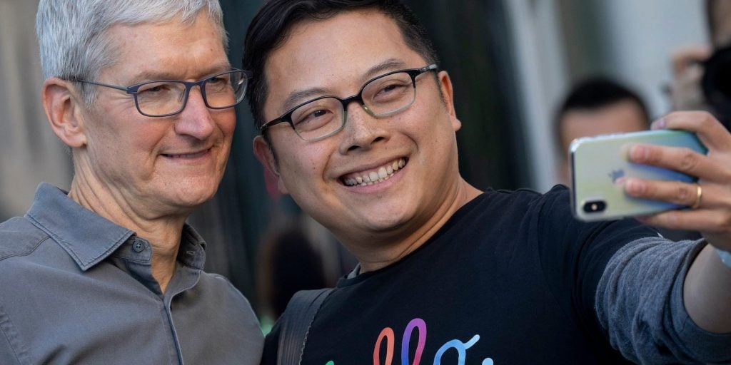 Tim Cook and a customer on September 20, 2019 in New York City.