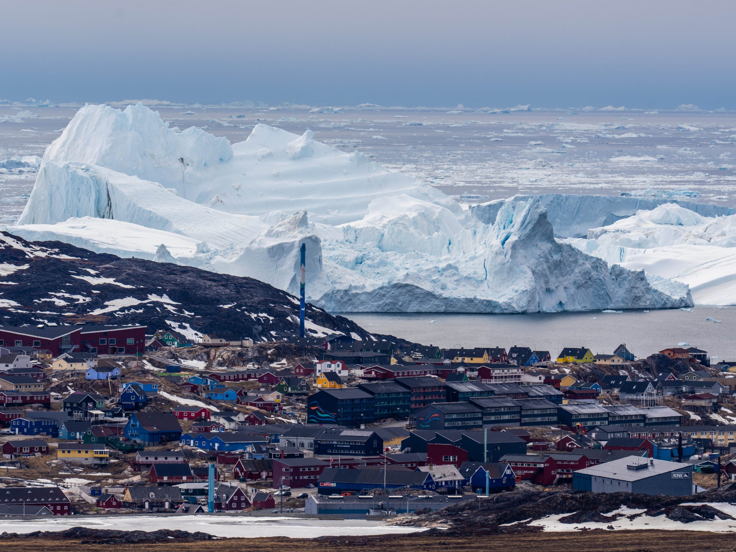 Icebergs near Ilulissat, Greenland. Climate change is having a profound effect in Greenland with glaciers and the Greenland ice cap retreating.
