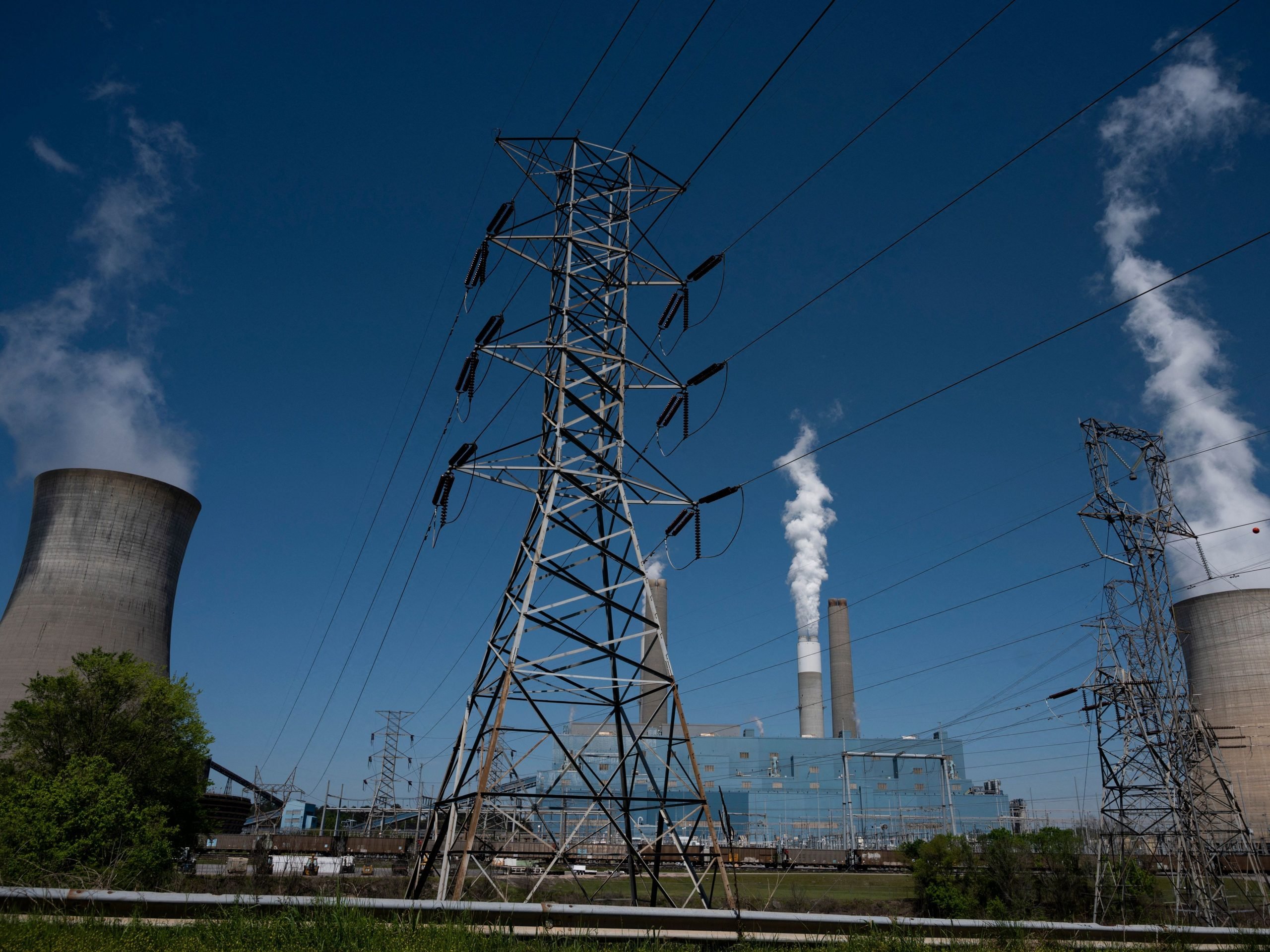 Steam rises from the Miller coal Power Plant in Adamsville, Alabama on April 13, 2021.