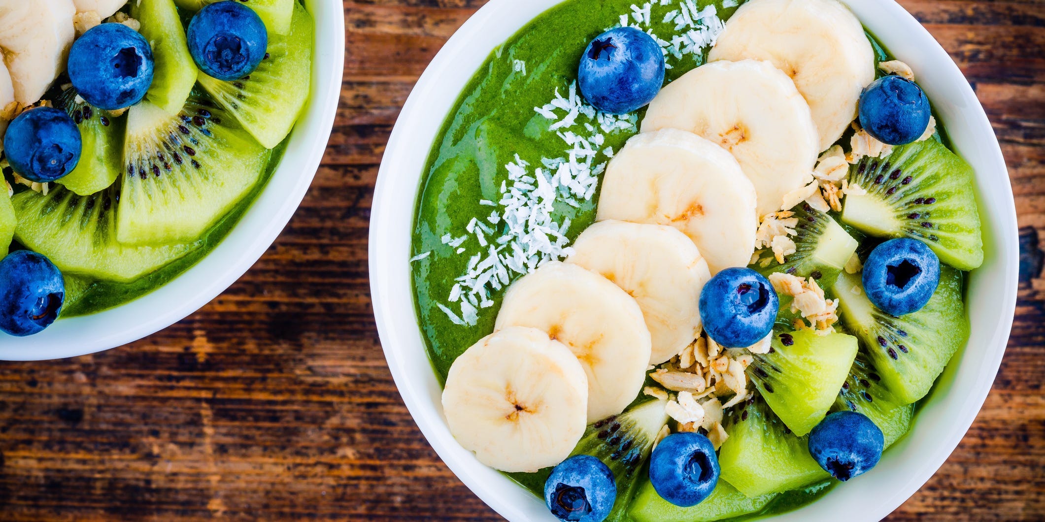 green smoothie bowl with granola blueberries kiwi banana