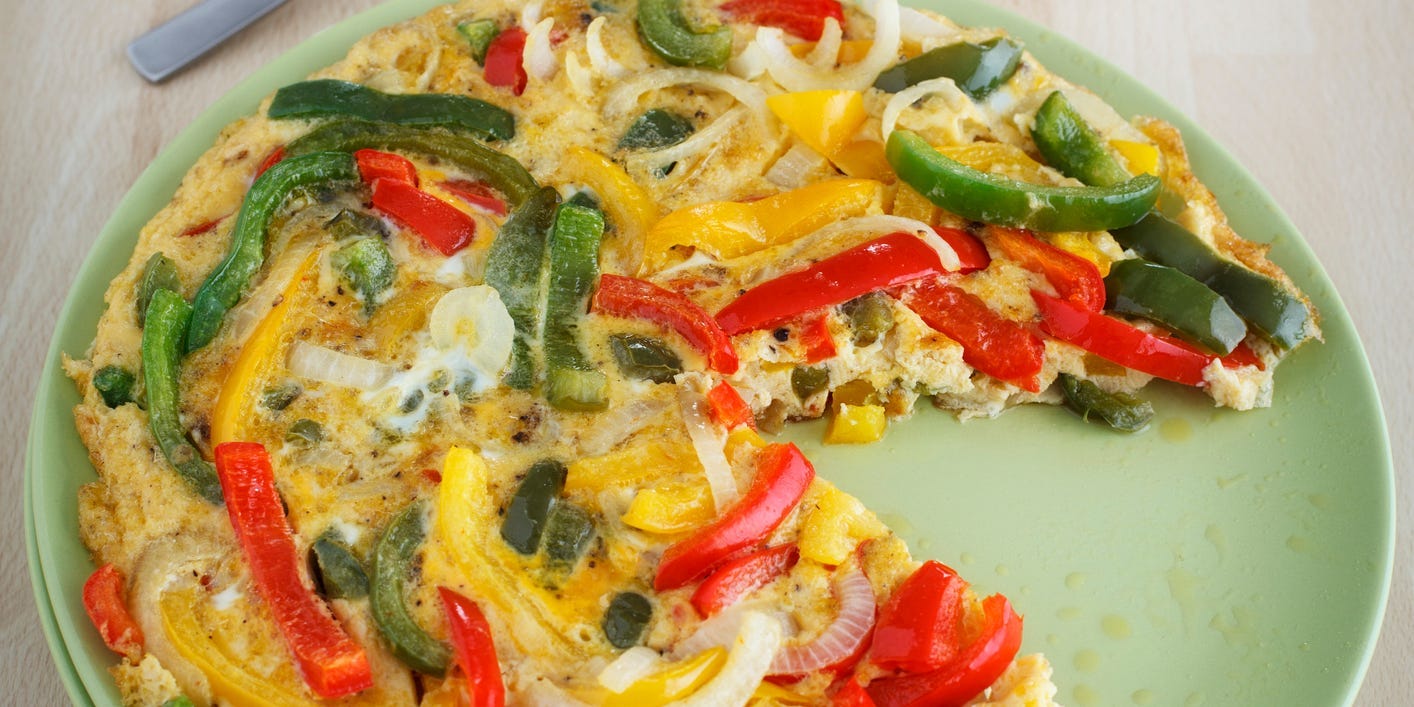 Omelette or frittata with green and red bell peppers and onions