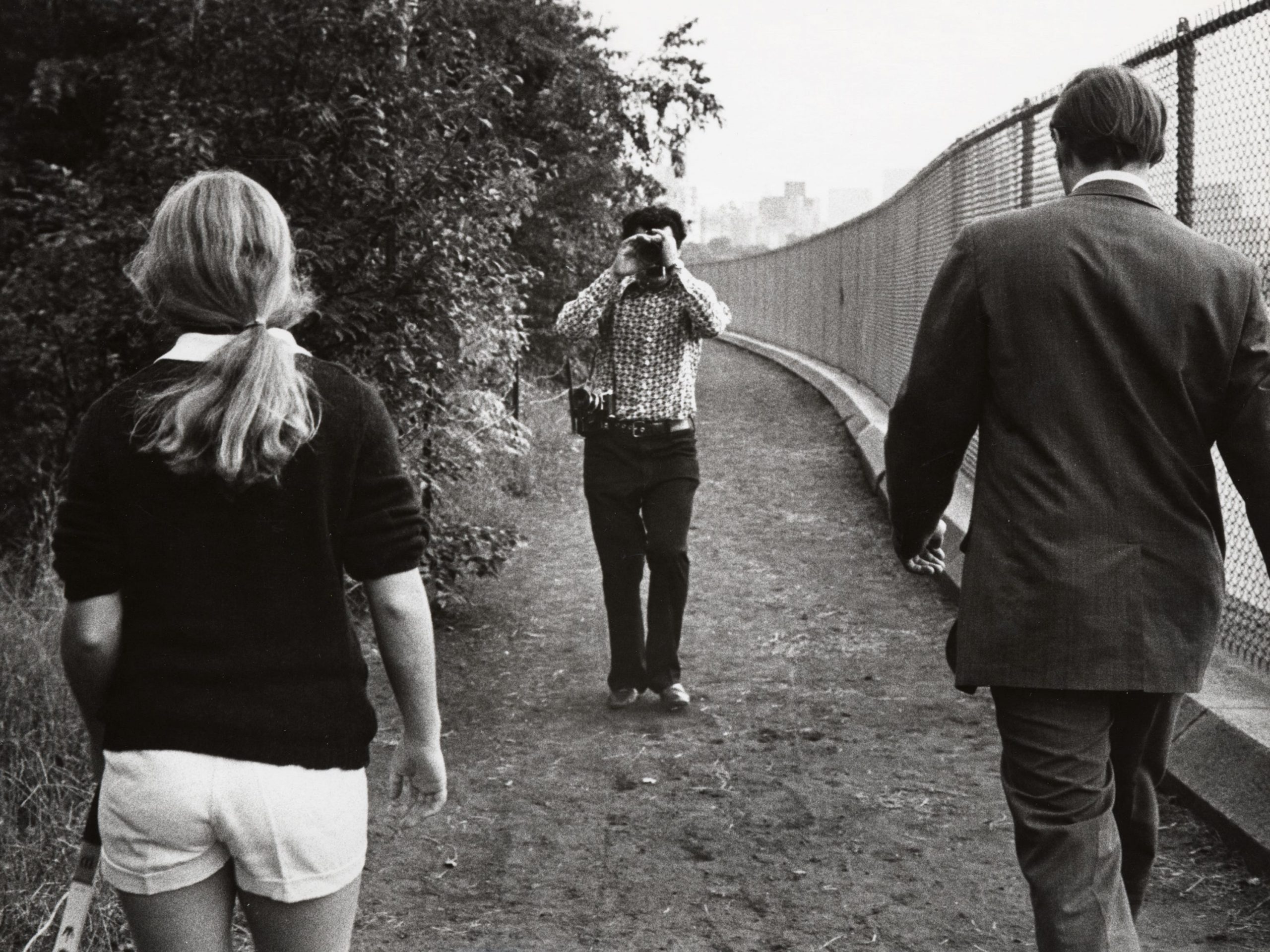 Ron Galella is seen photographing Caroline Kennedy and a Secret Service Agent