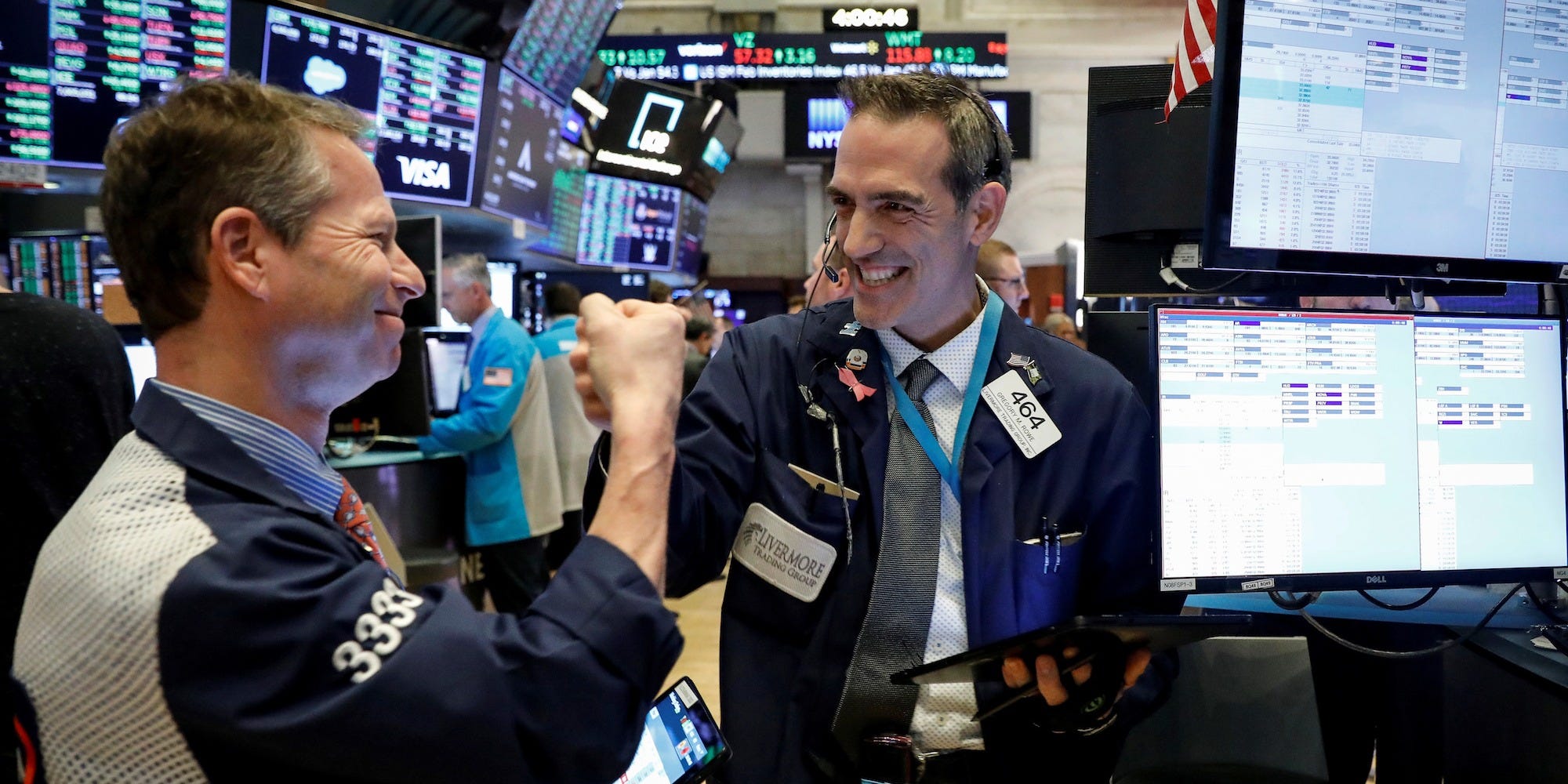 trader nyse celebrate happy fist bump