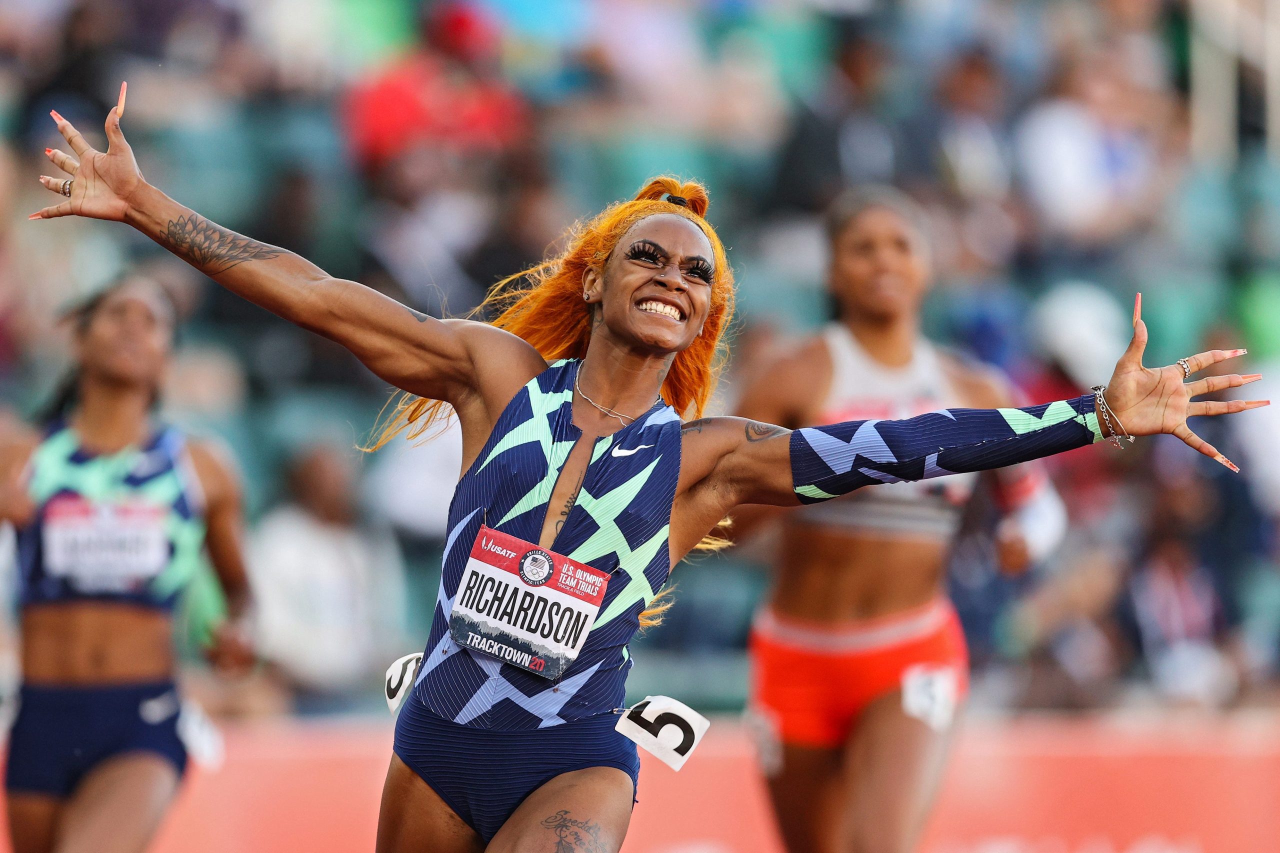 Sha'Carri Richardson celebrates winning the Women's 100 Meter final on day 2 of the 2020 U.S. Olympic Track & Field Team Trials