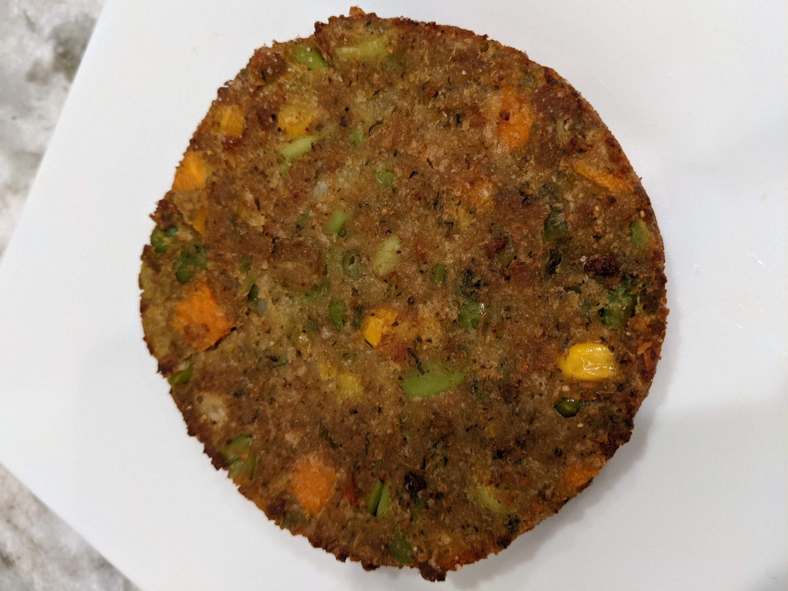 Aldi veggie burger on a white plate