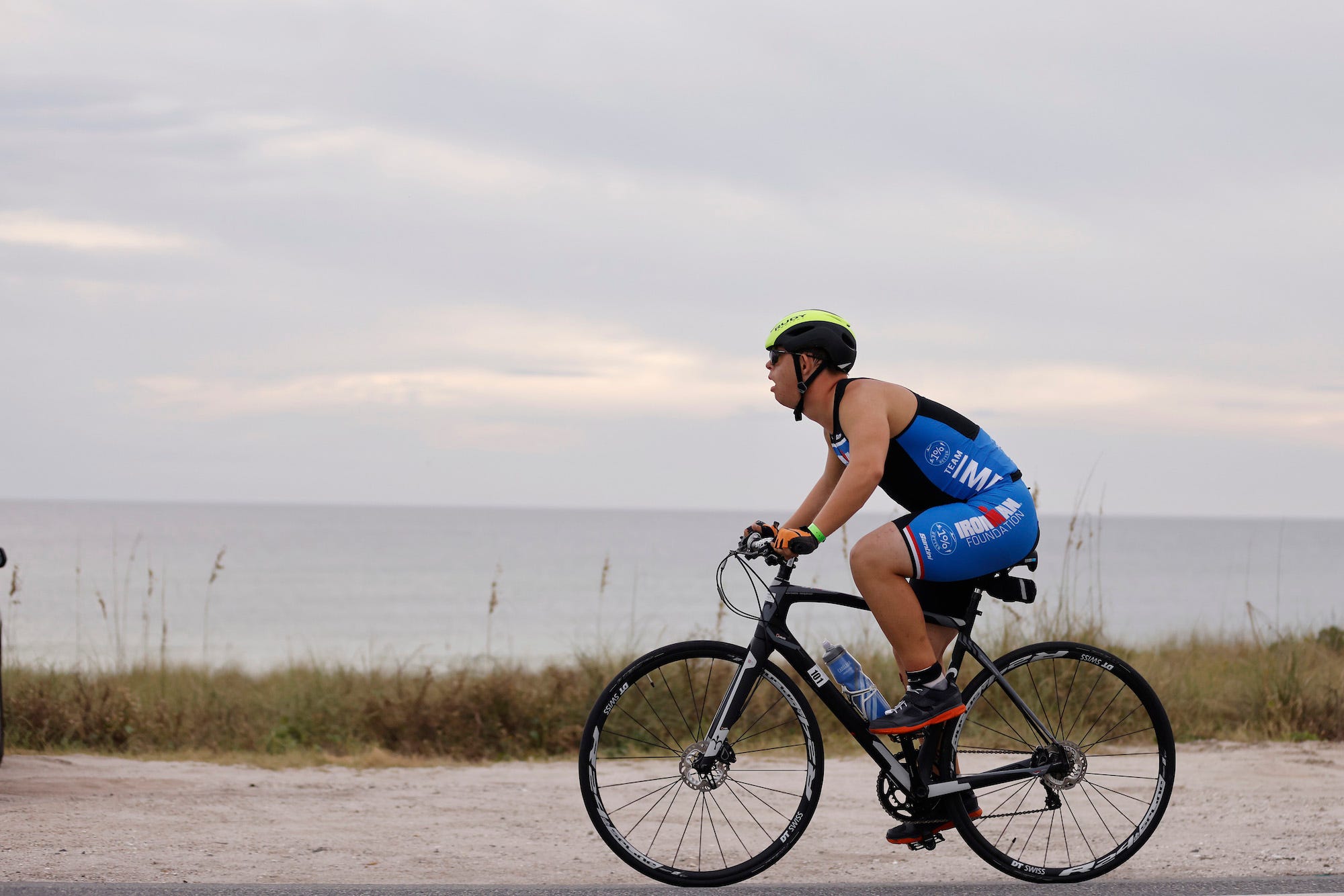 Chris Nikic competes in the bike portion of IRONMAN Florida