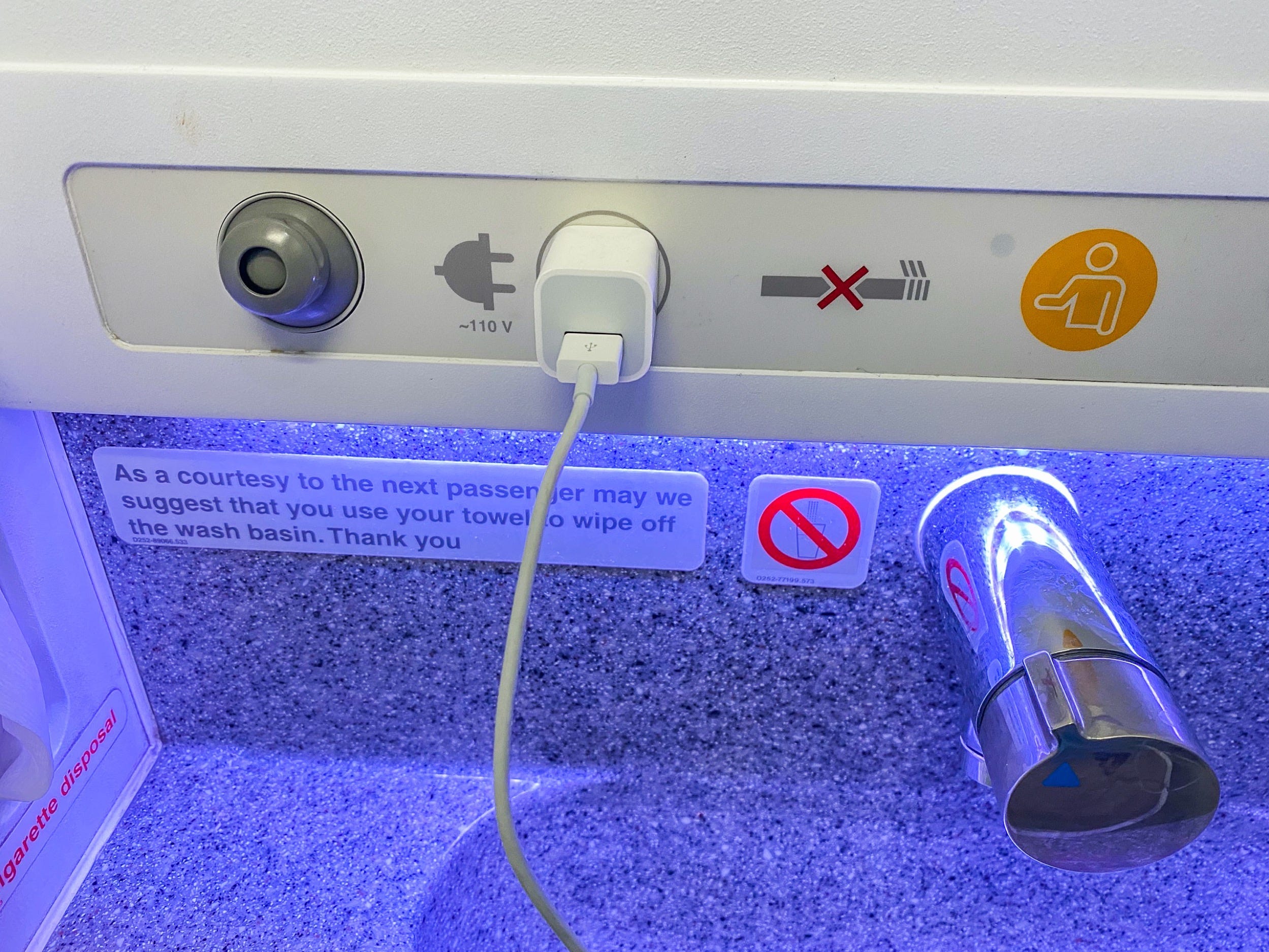 Airplane lavatory power outlet