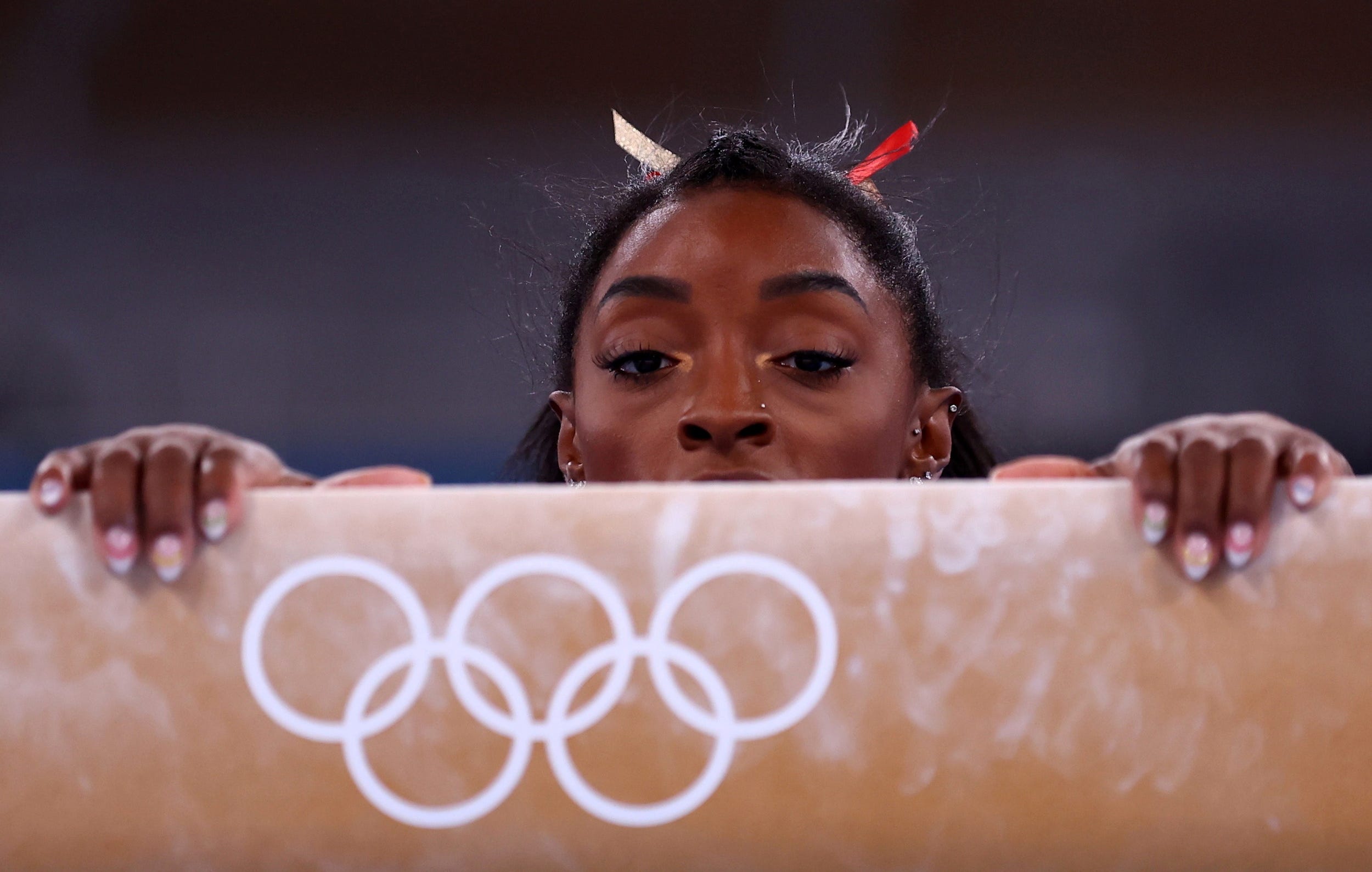 Simone Biles prepares for the balance beam.