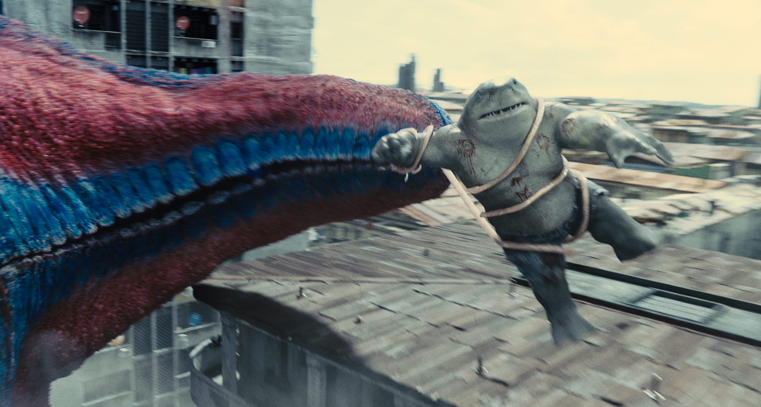 King Shark gets tossed by Starro in "The Suicide Squad."