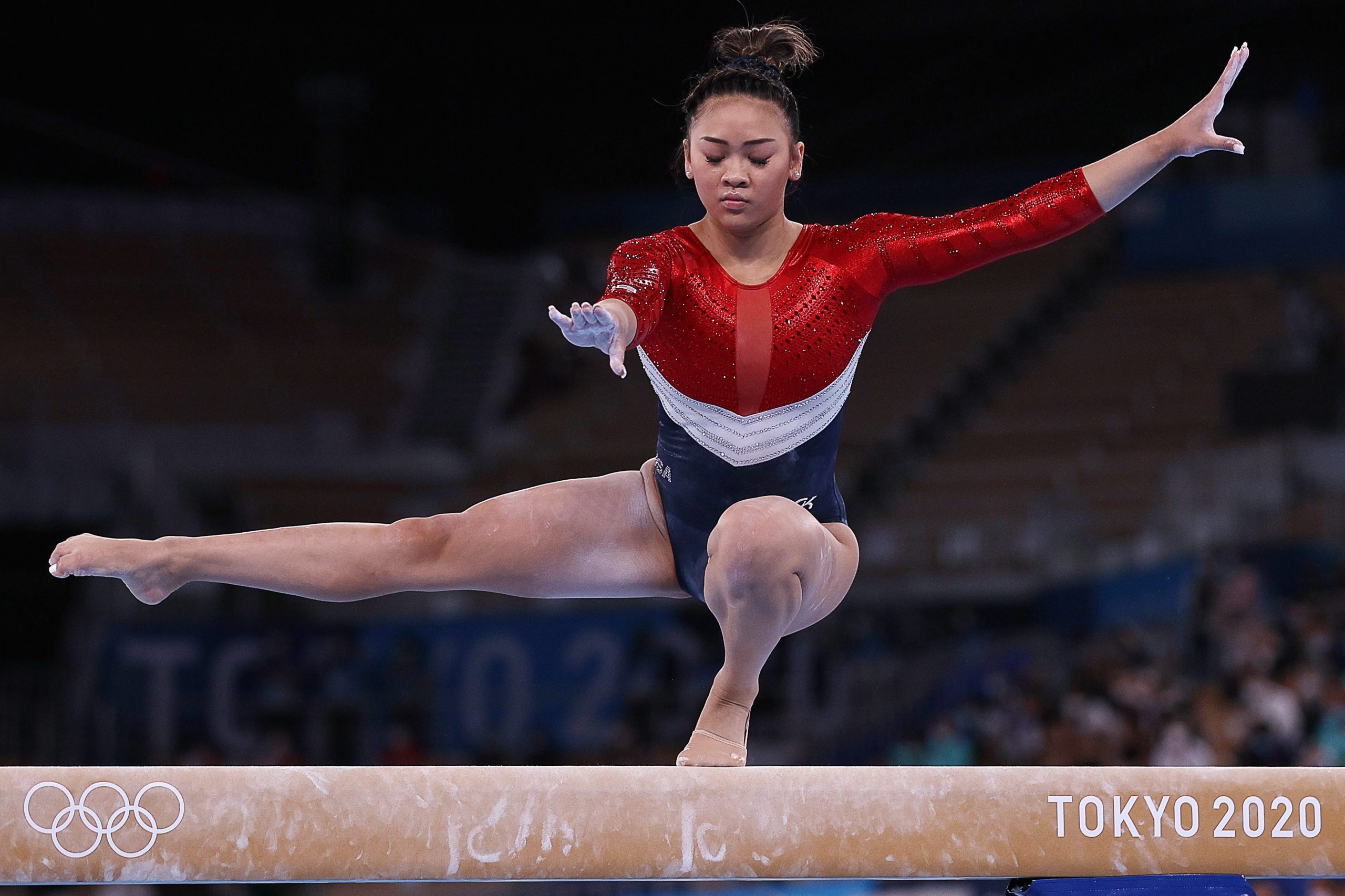 Suni Lee competes on balance beam