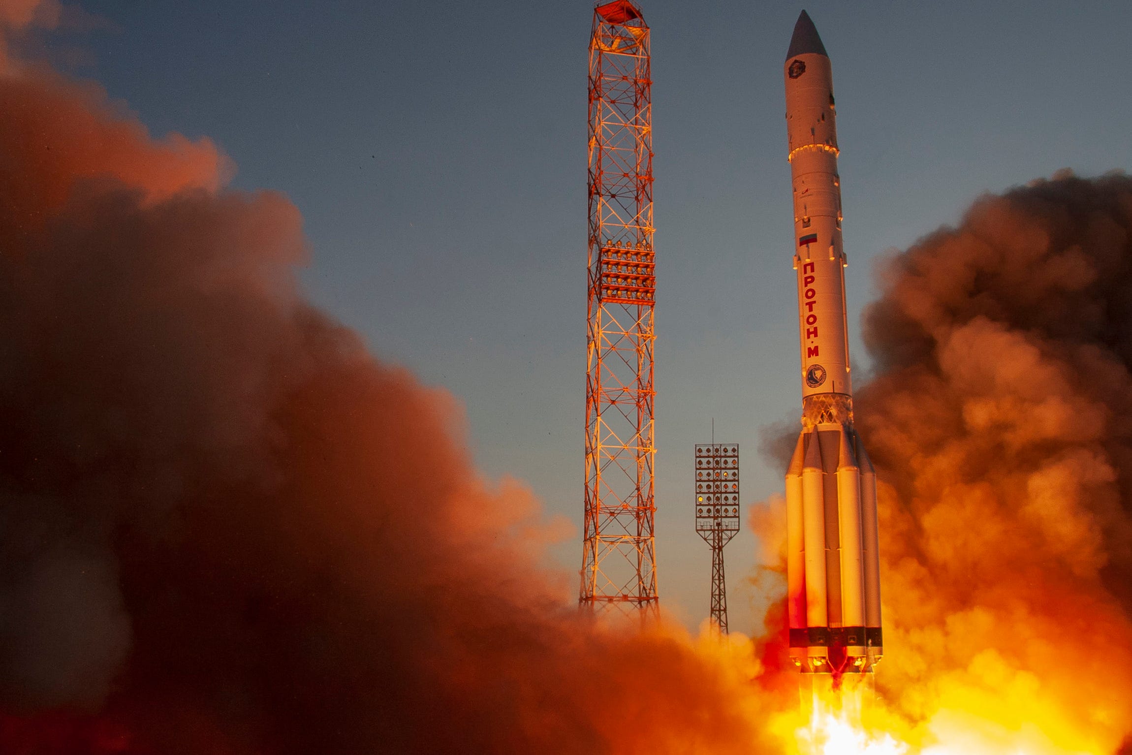 proton m rocket fires engines blasts off from launchpad carrying nauka module