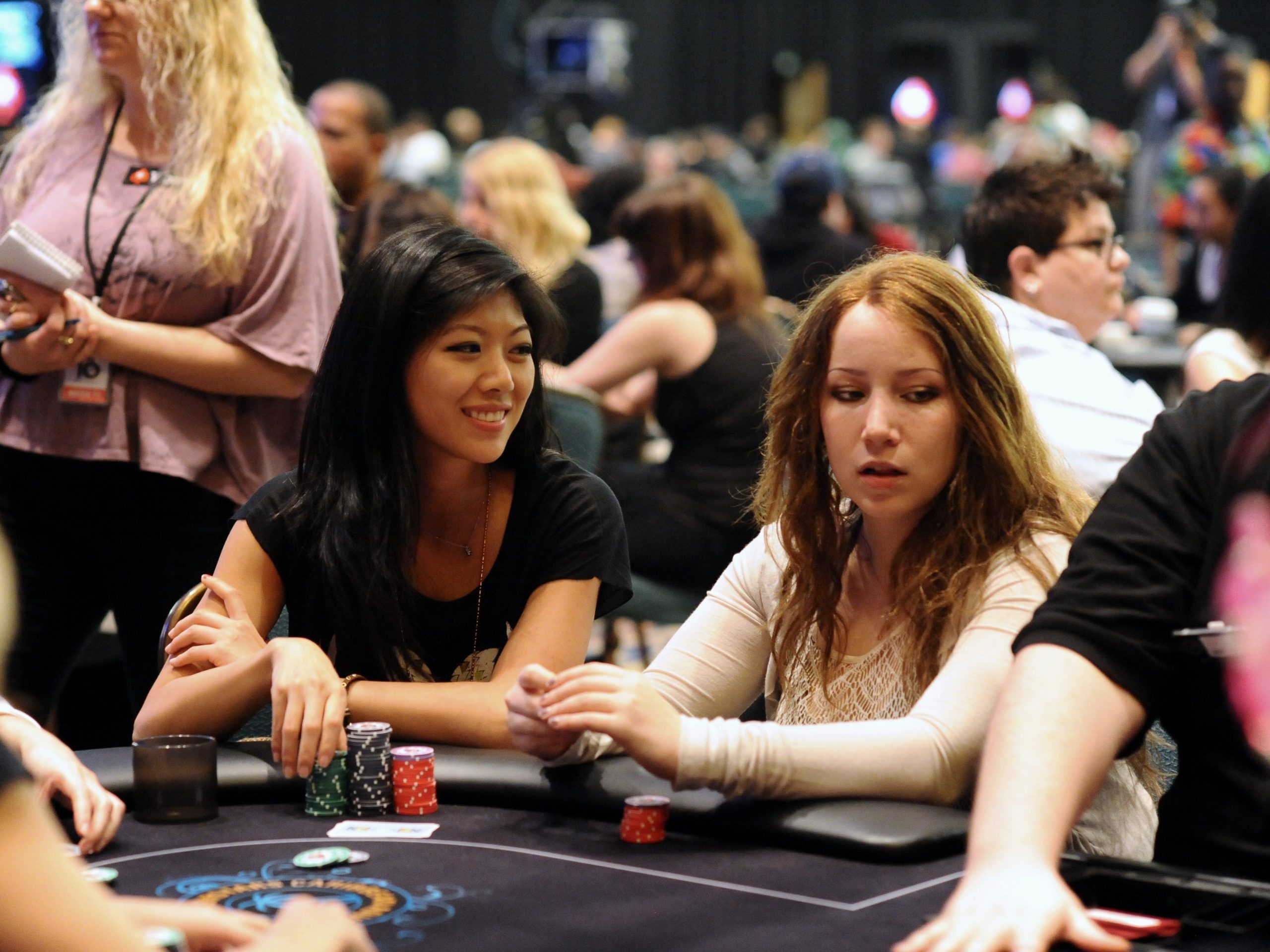 Liu with fellow players at a poker tournament. Xuan Liu