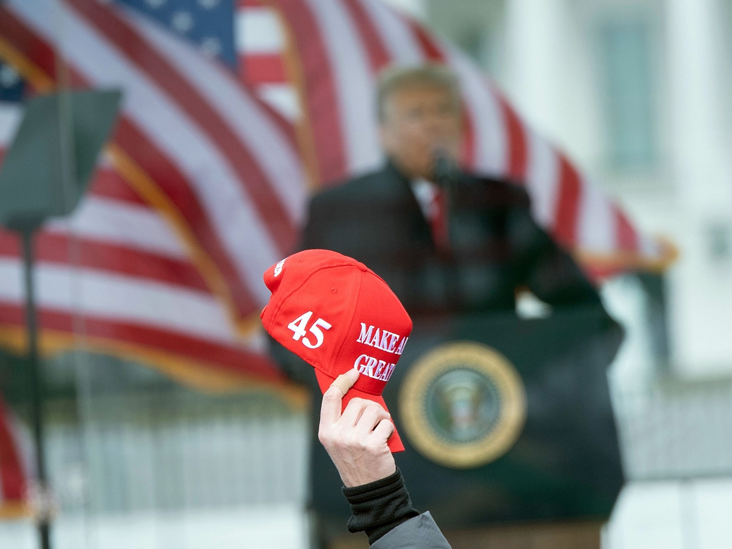 Trump speaks on January 6 with MAGA hat in frame