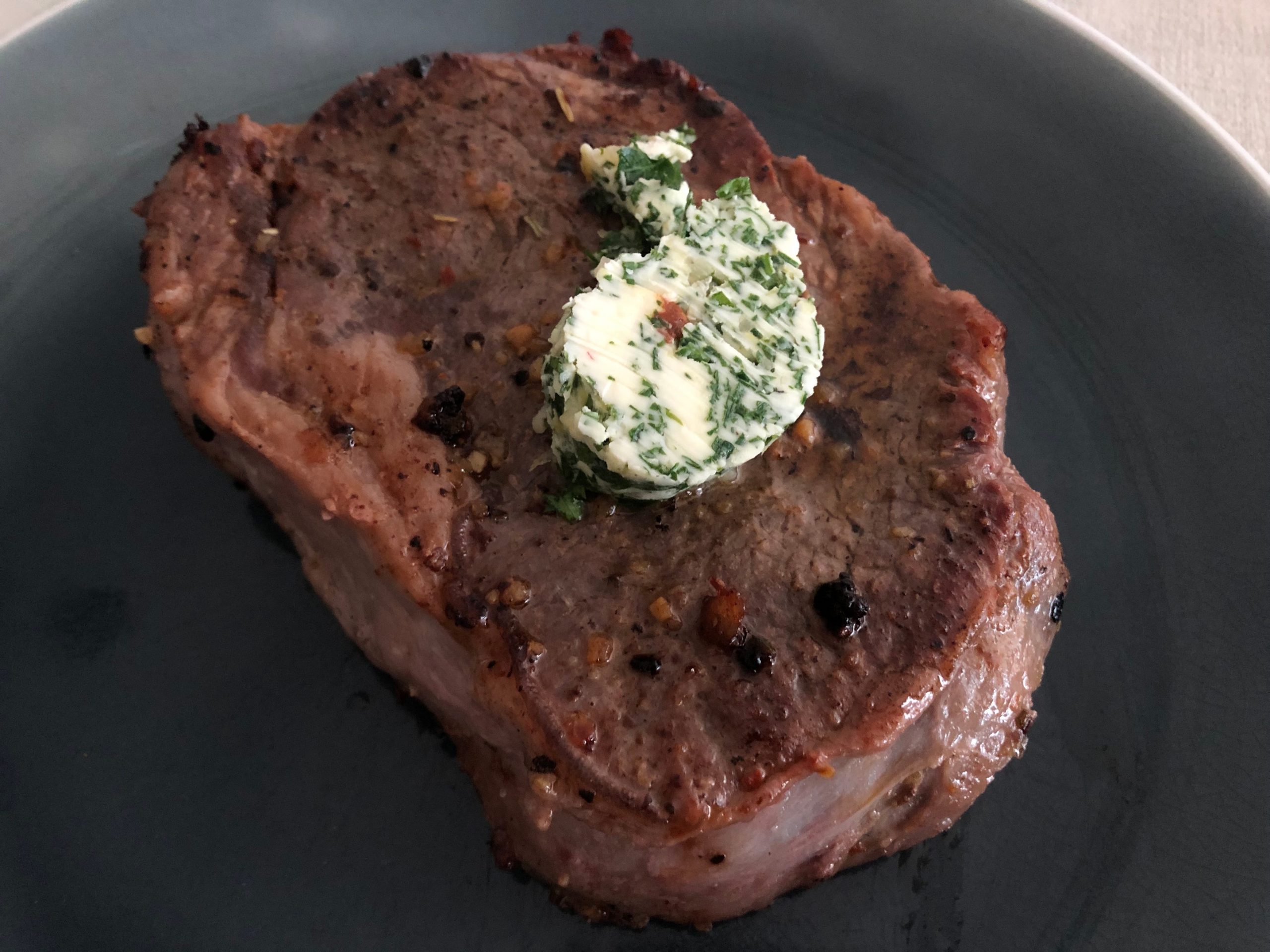 Steak with herb butter.