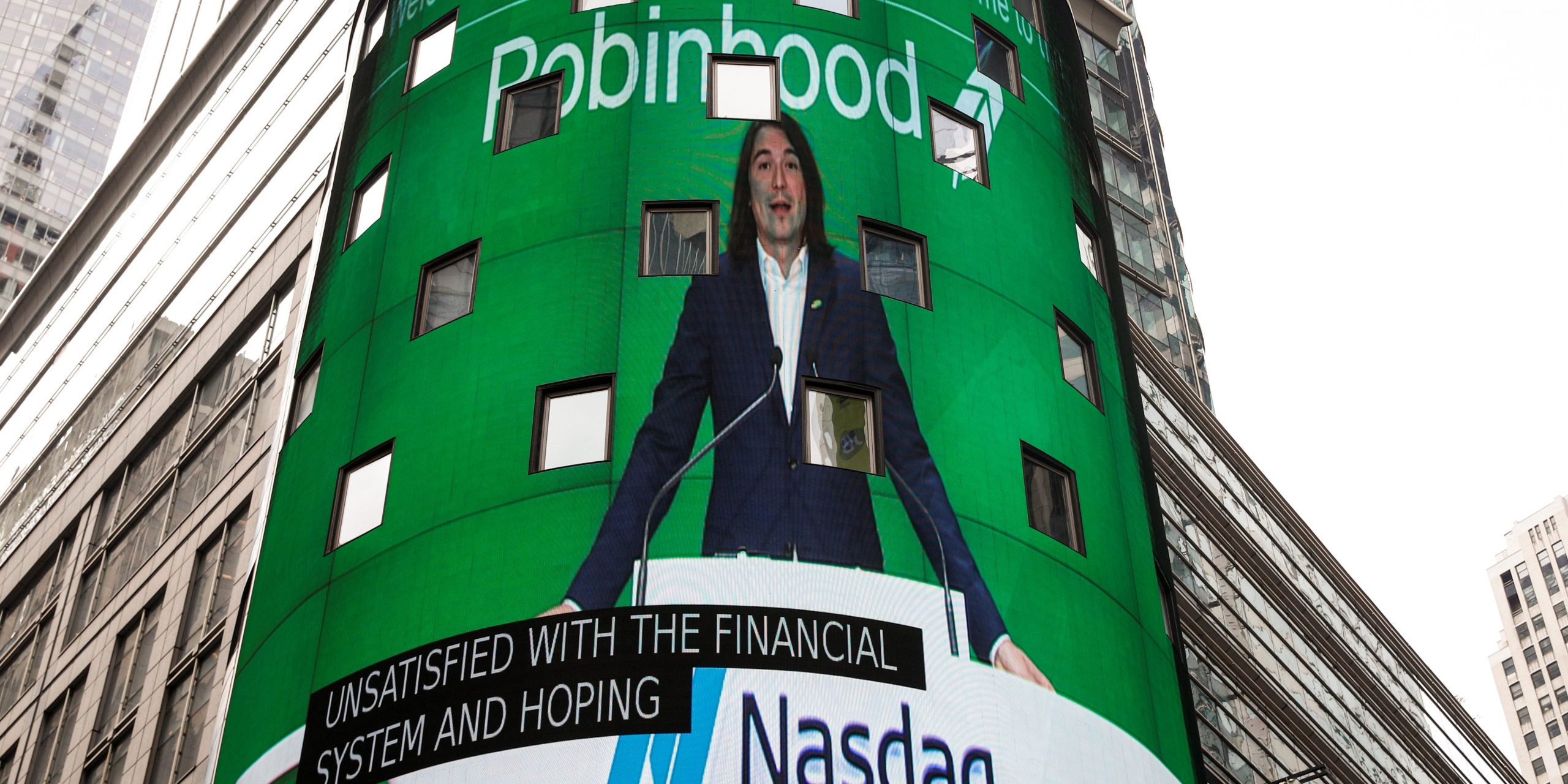 Robinhood Vlad standing at Nasdaq time square billboard