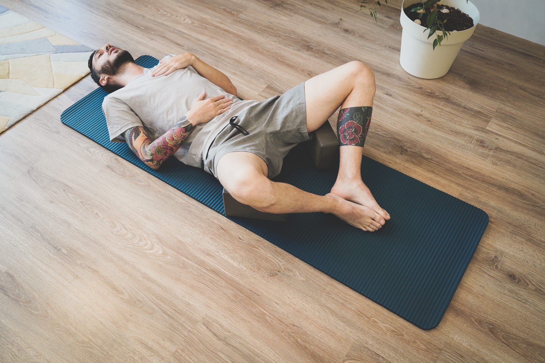 man practicing diaphragmatic breathing