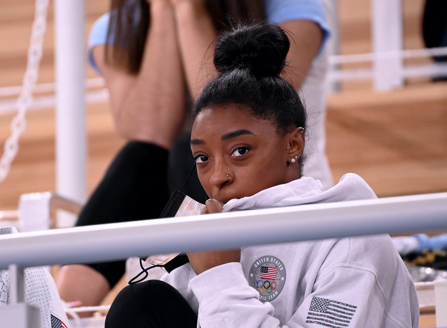 Simone Biles from the USA follows the gymastics events from the stands at the Olympic Games in Tokyo.