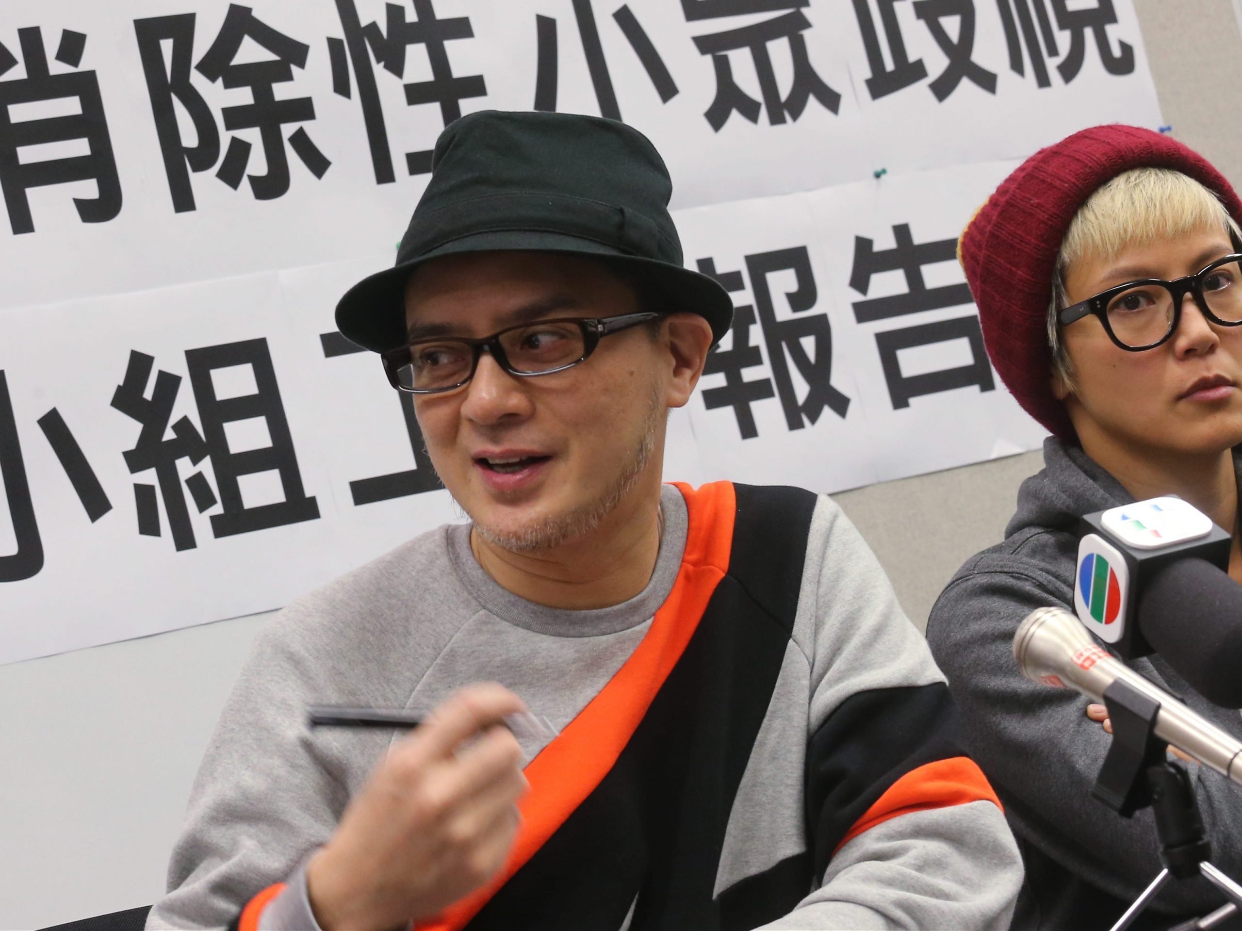 Singer Anthony Wong Yiu-Ming (L) and Singer Denise Ho Wan-see (R) attend a press conference on a report submitted by the Advisory Group on Eliminating Discrimination against Sexual Minorities to the Hong Kong government, January 21, 2016.