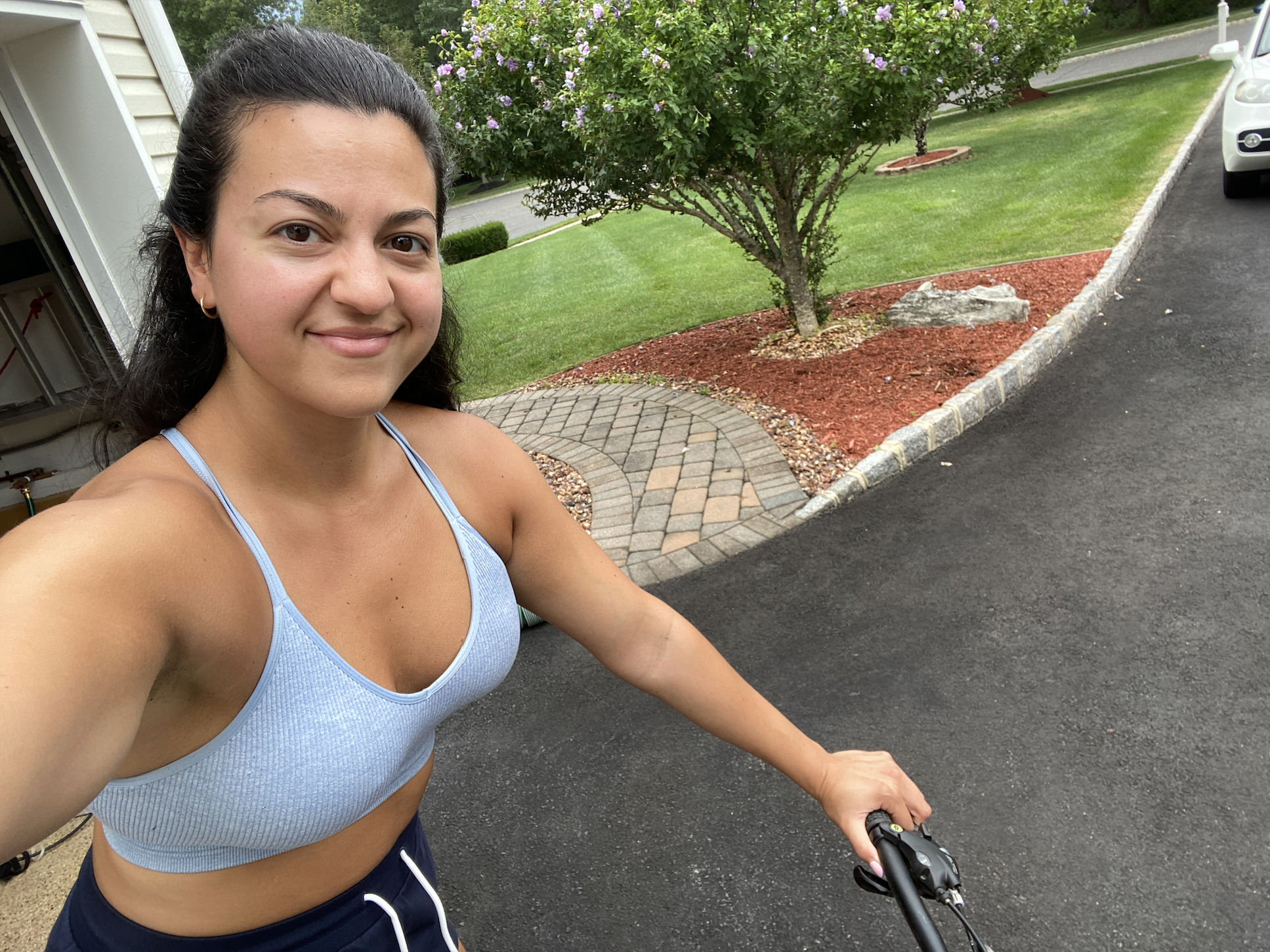 The writer taking a selfie on her bike